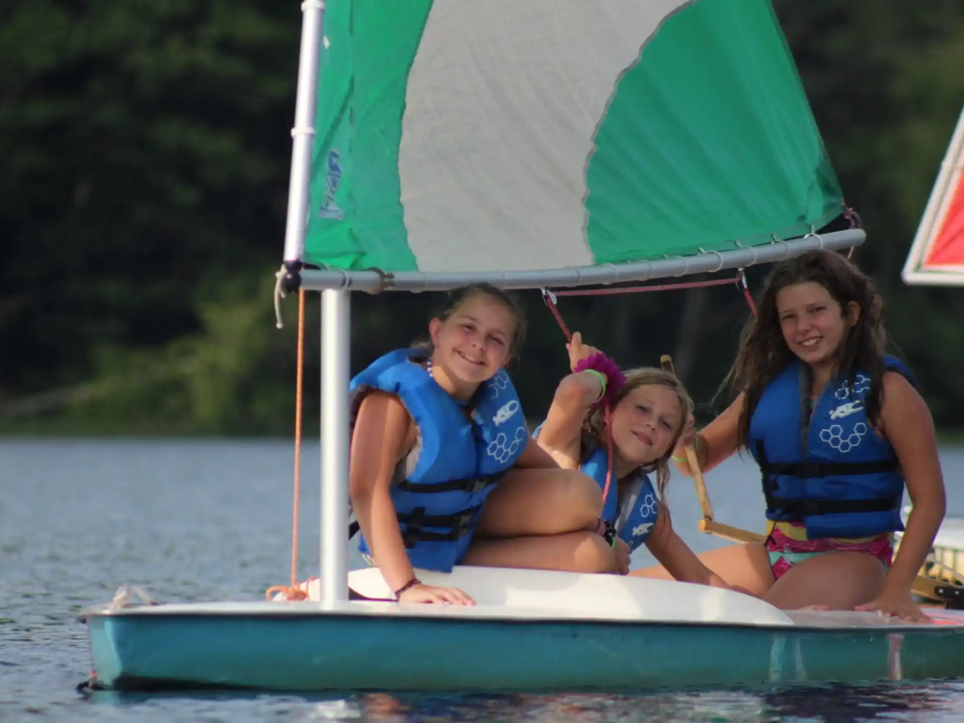 a group of women on a boat