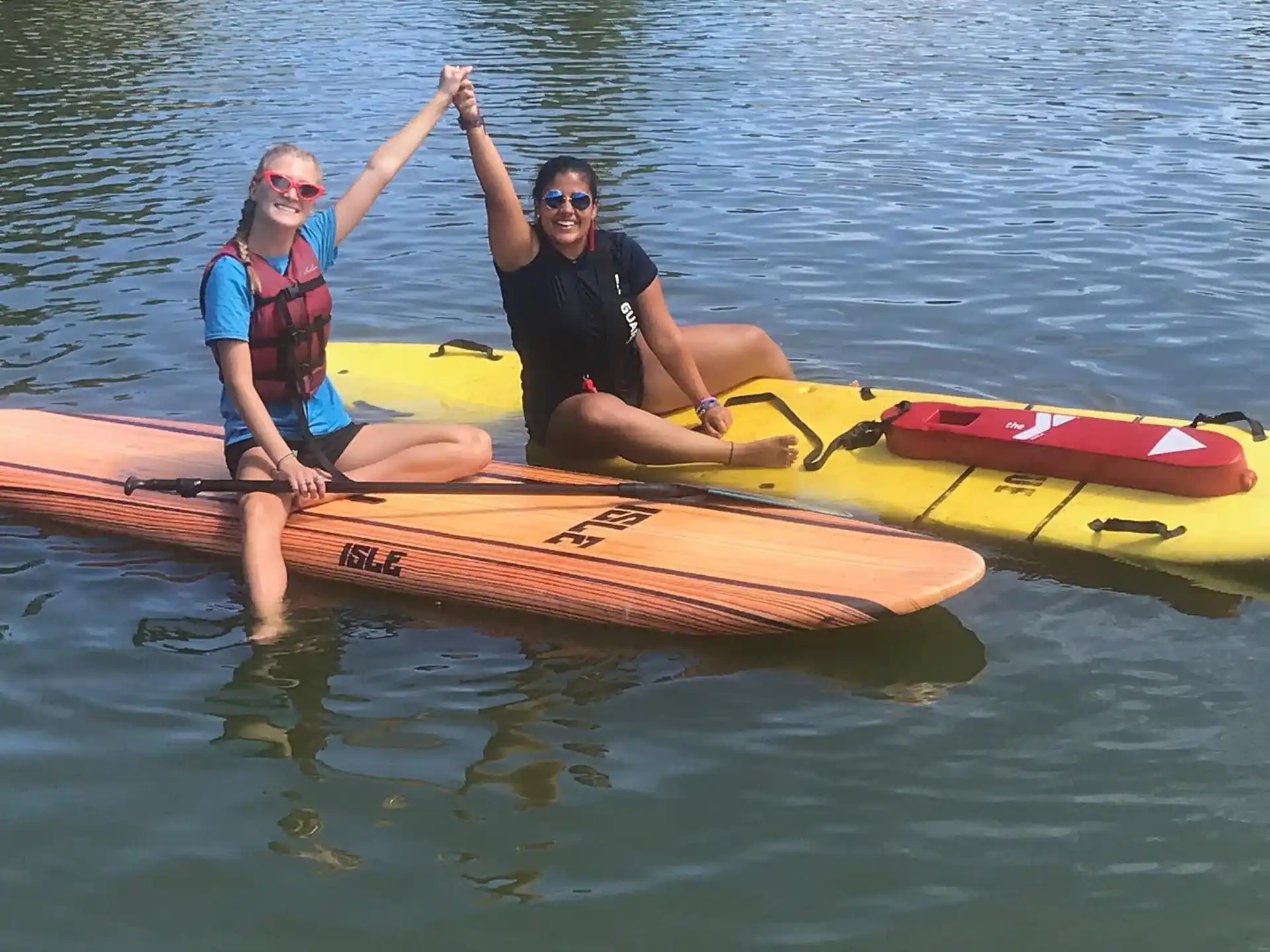 a man and woman in a canoe