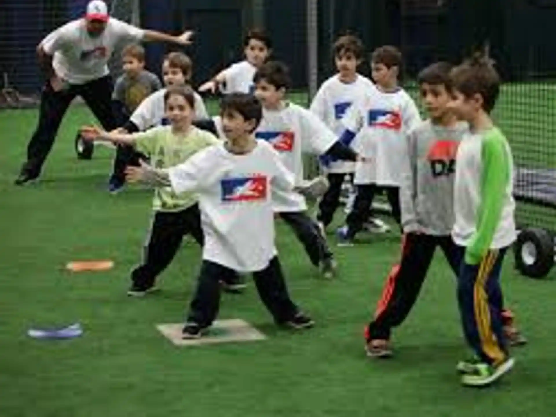 a group of kids playing football