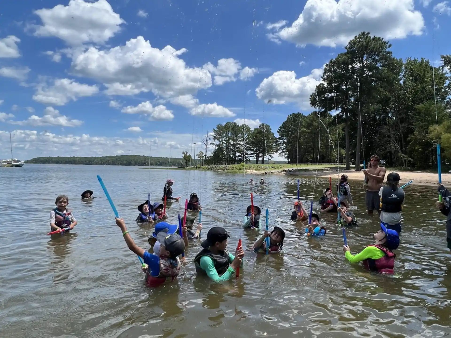 a group of people in a body of water