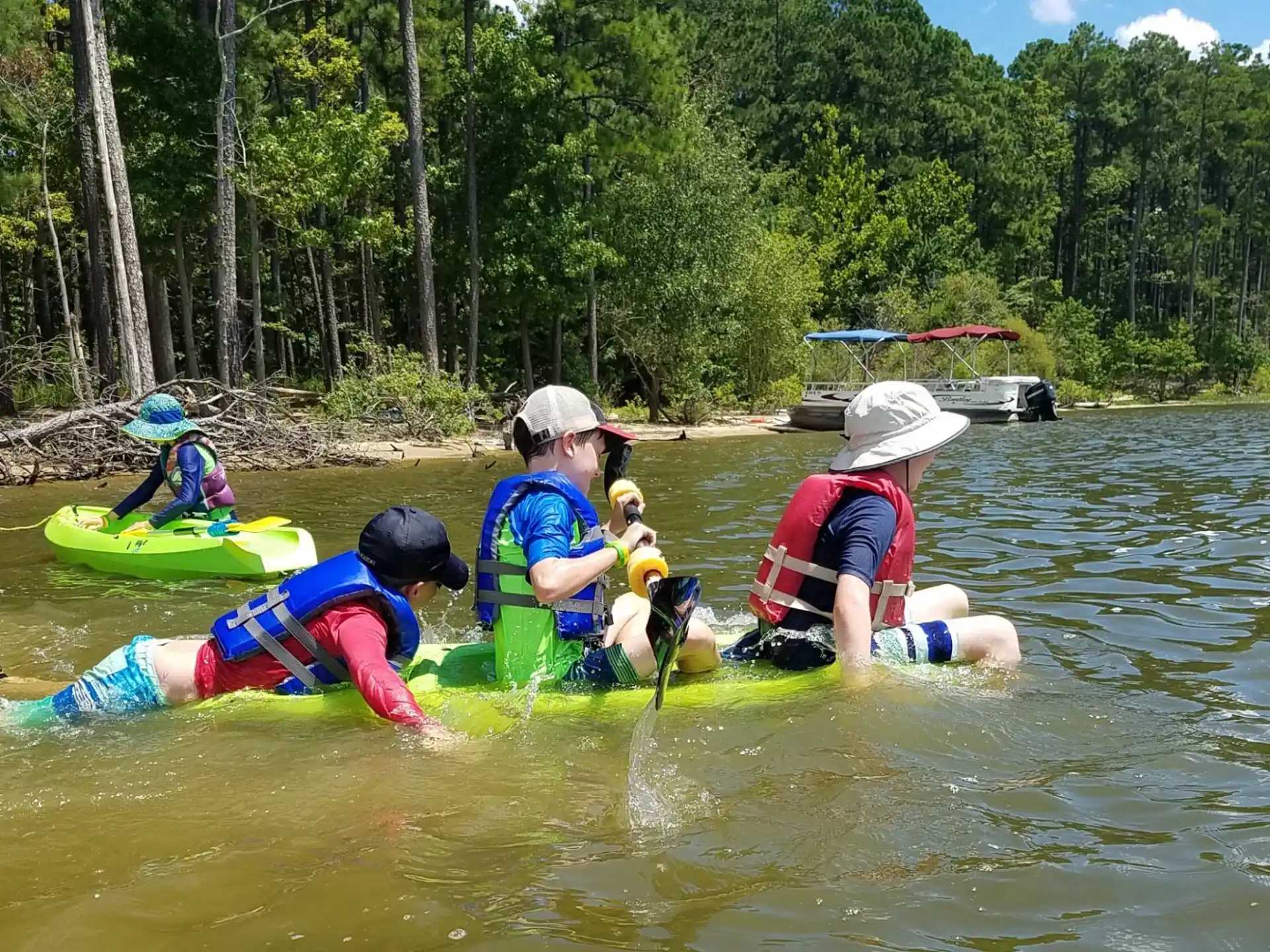 a group of people in a river