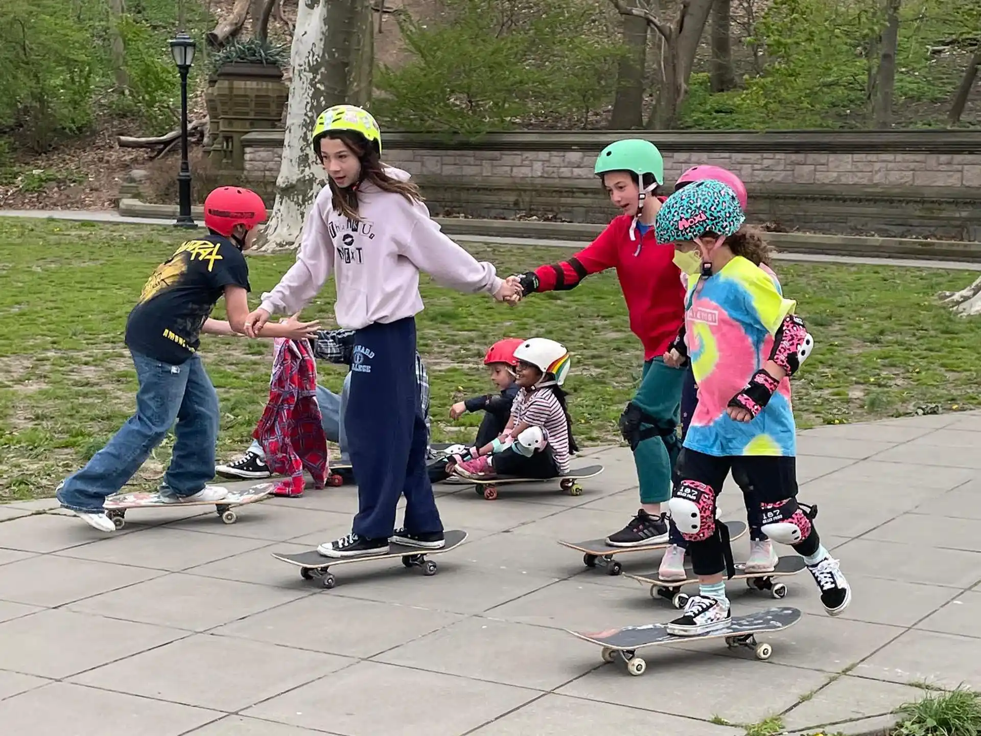a group of kids on skateboards