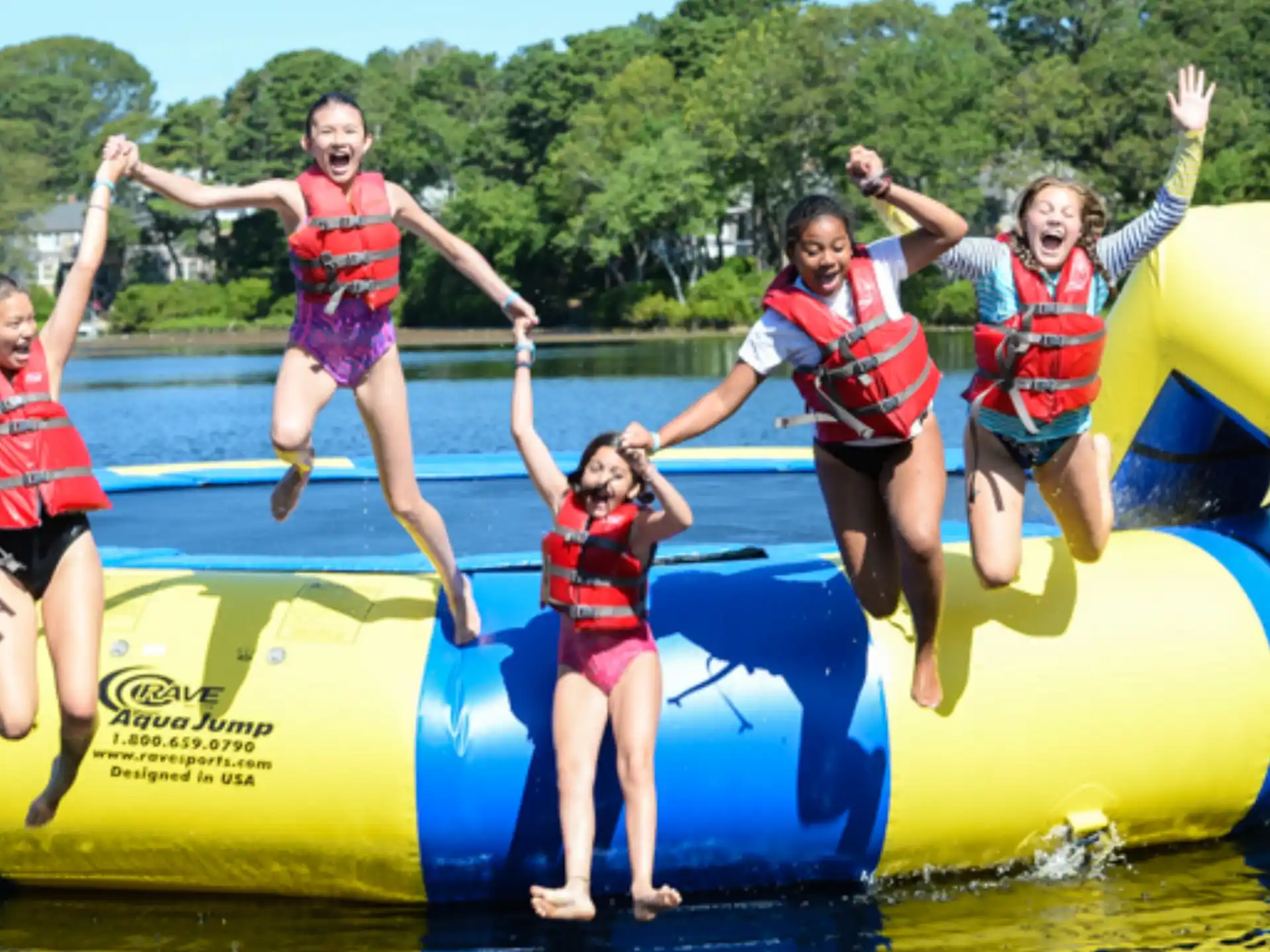 a group of children on a raft