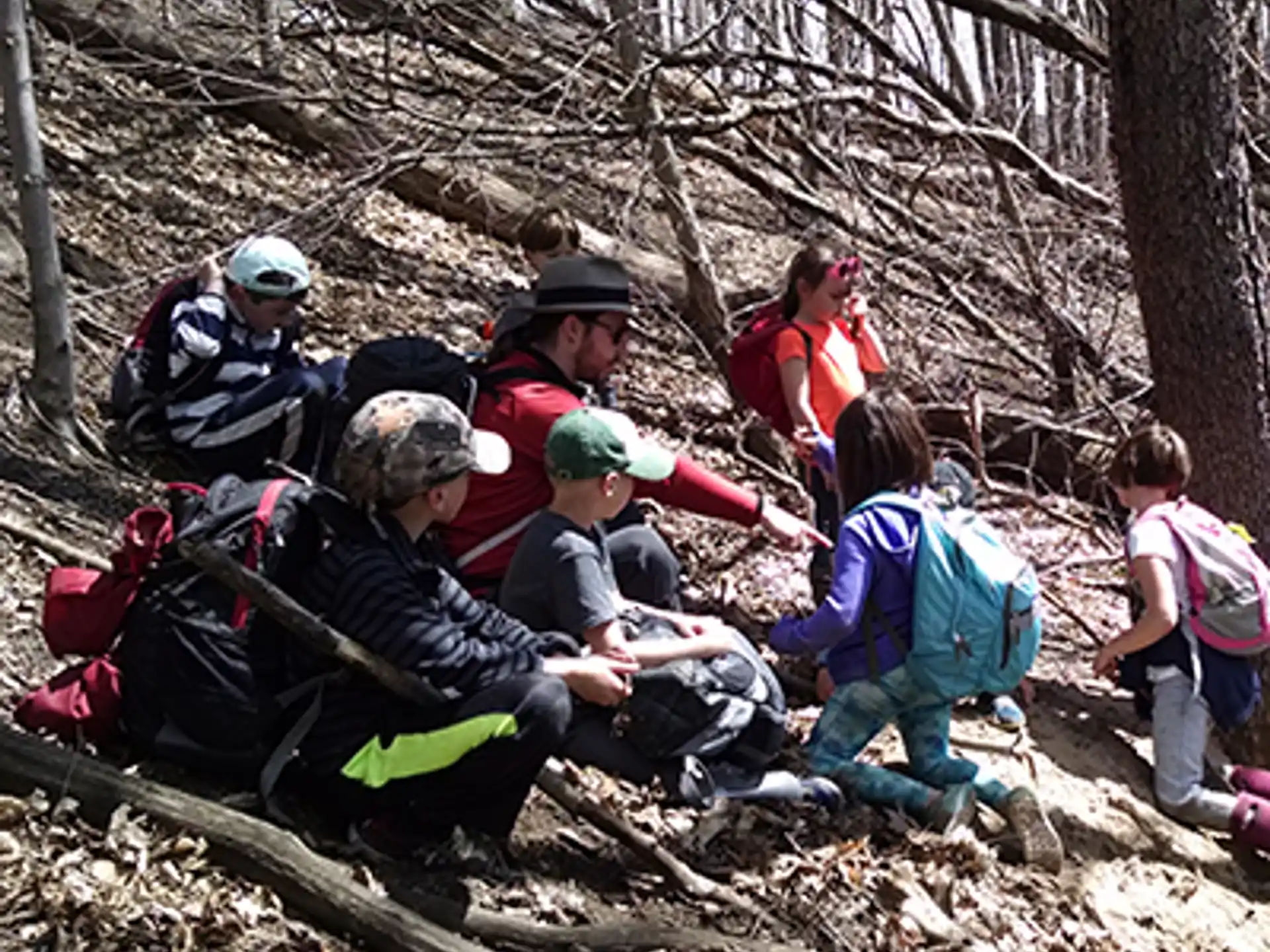a group of people in the woods