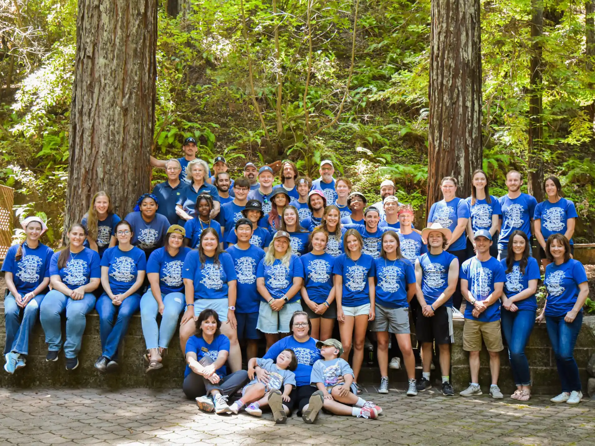 a group of people posing for a photo