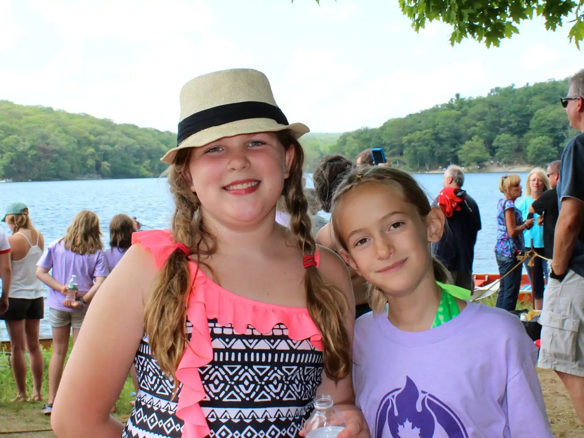 a couple of girls posing for a picture