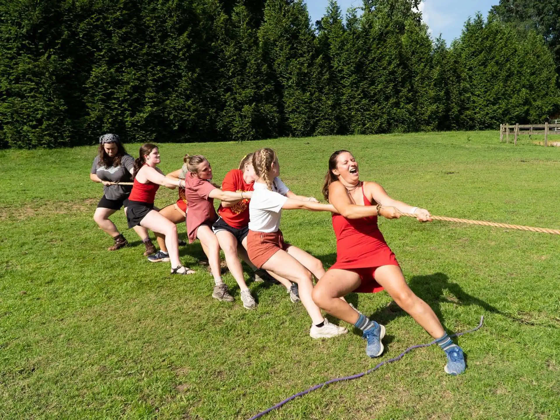 a group of women running on a track