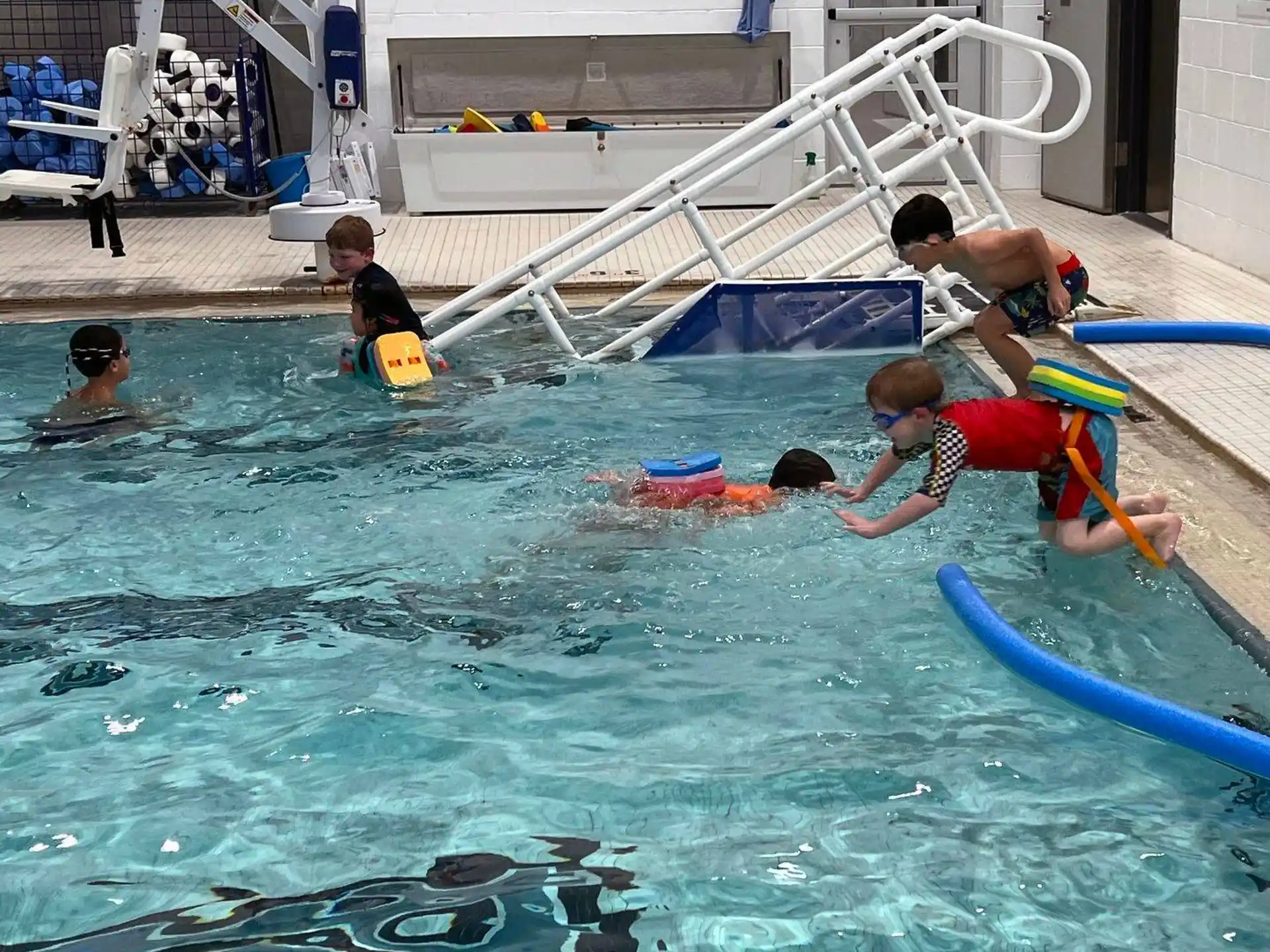 a group of people in a pool