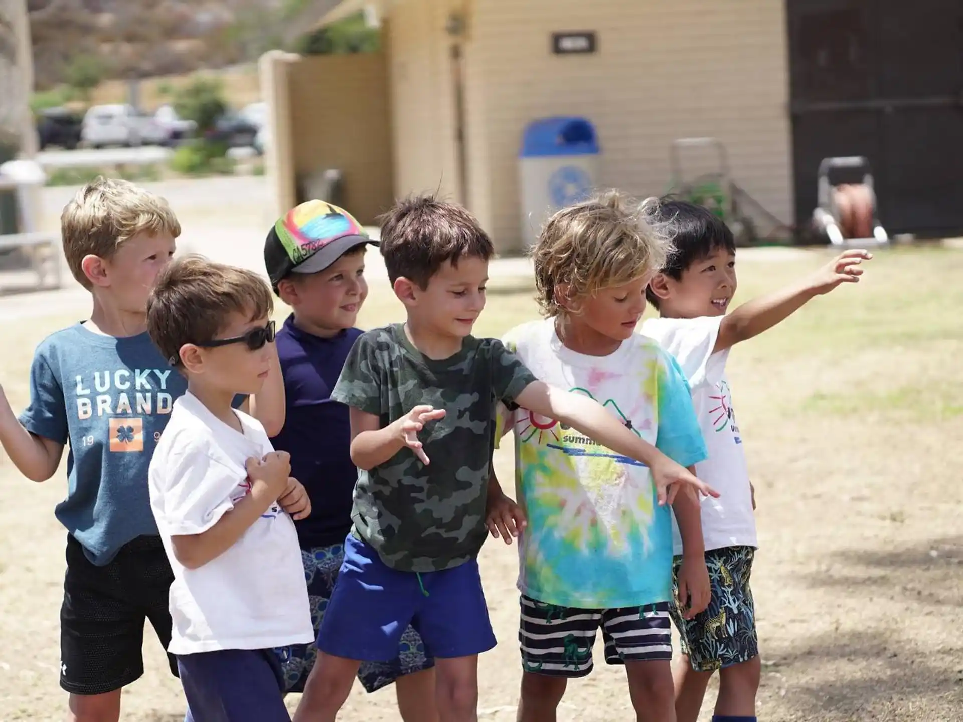 a group of kids playing outside