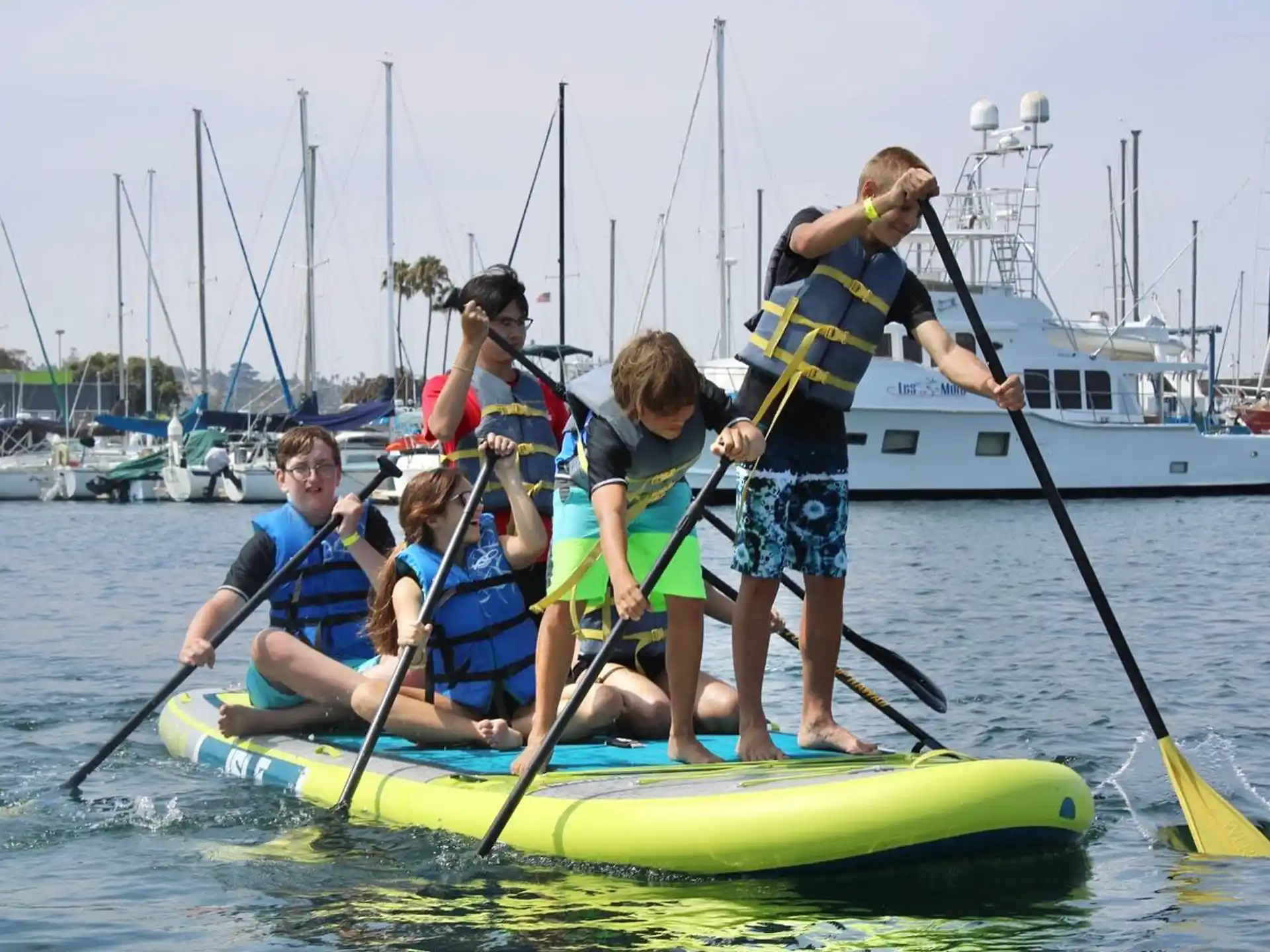 a group of people in a canoe