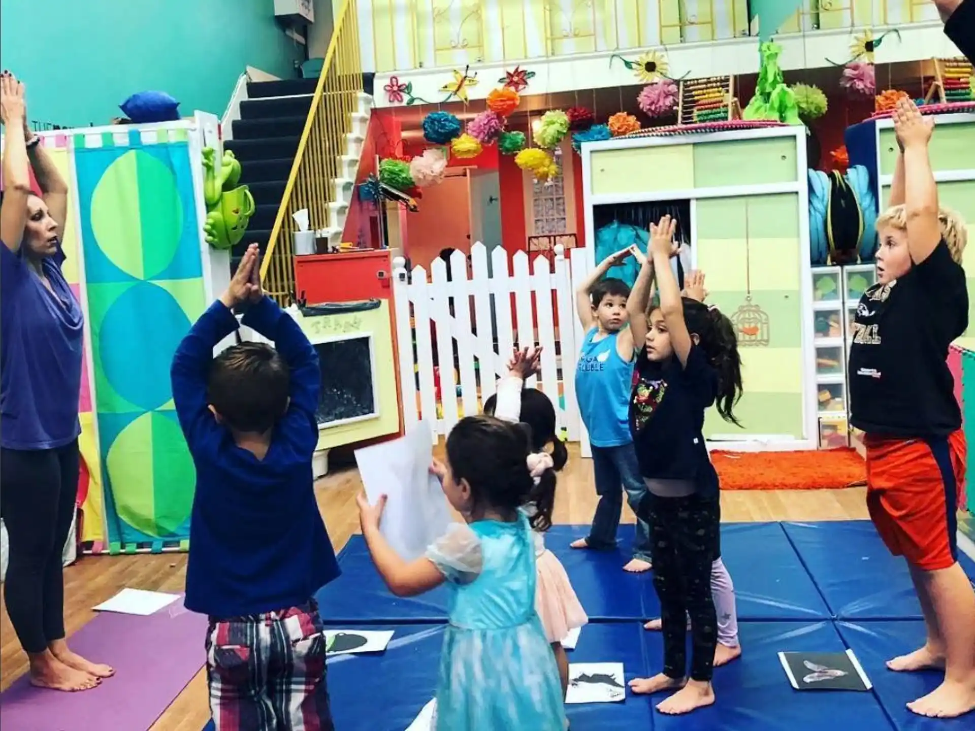 a group of children playing in a room