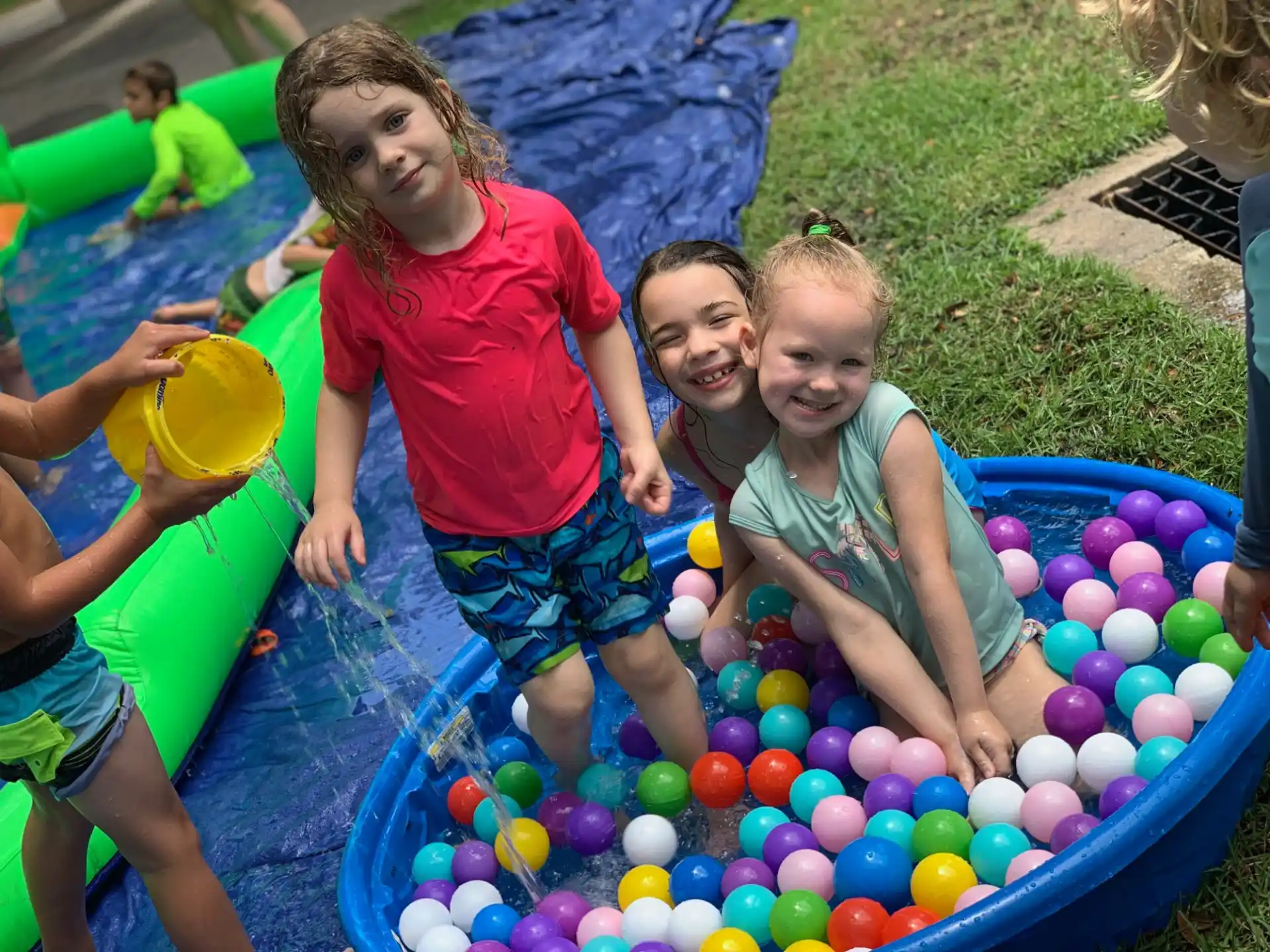 a group of kids in a pool
