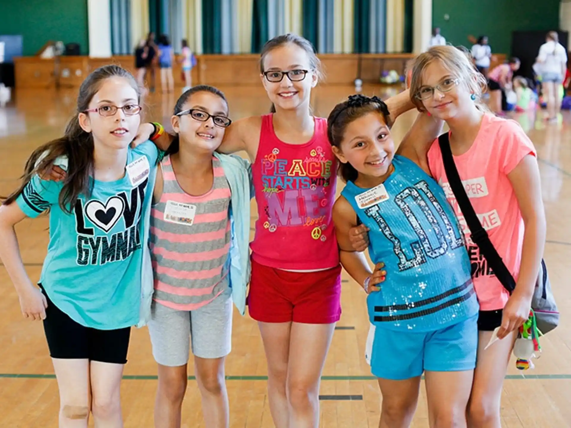 a group of girls posing for a photo