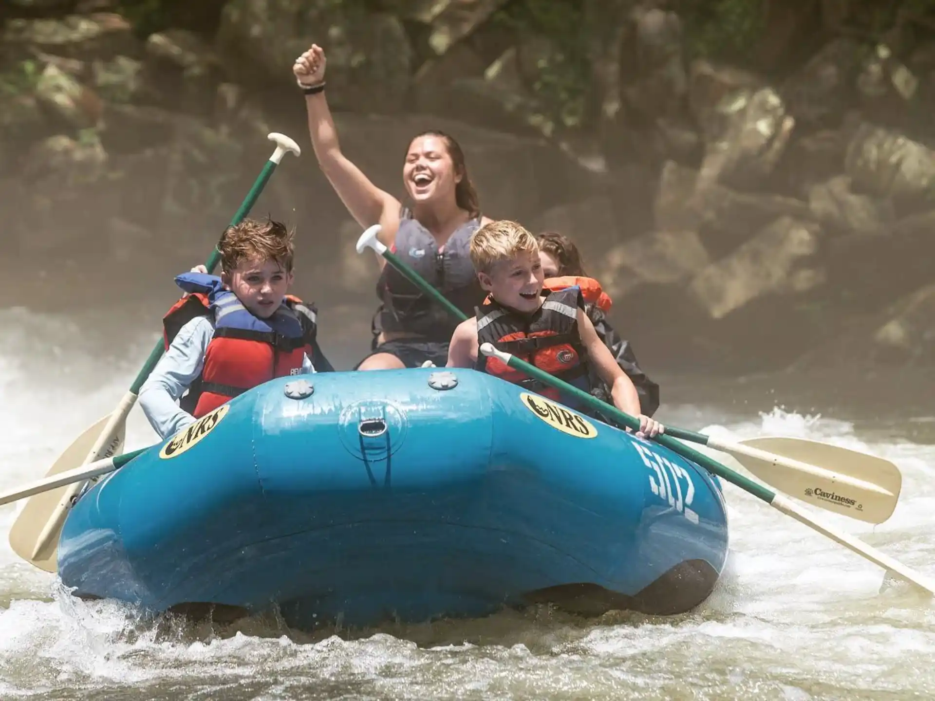 a group of people in a raft