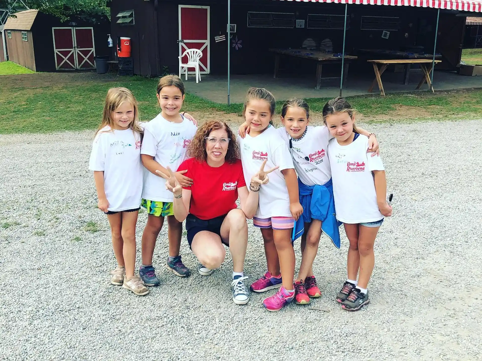 a group of children posing for a photo