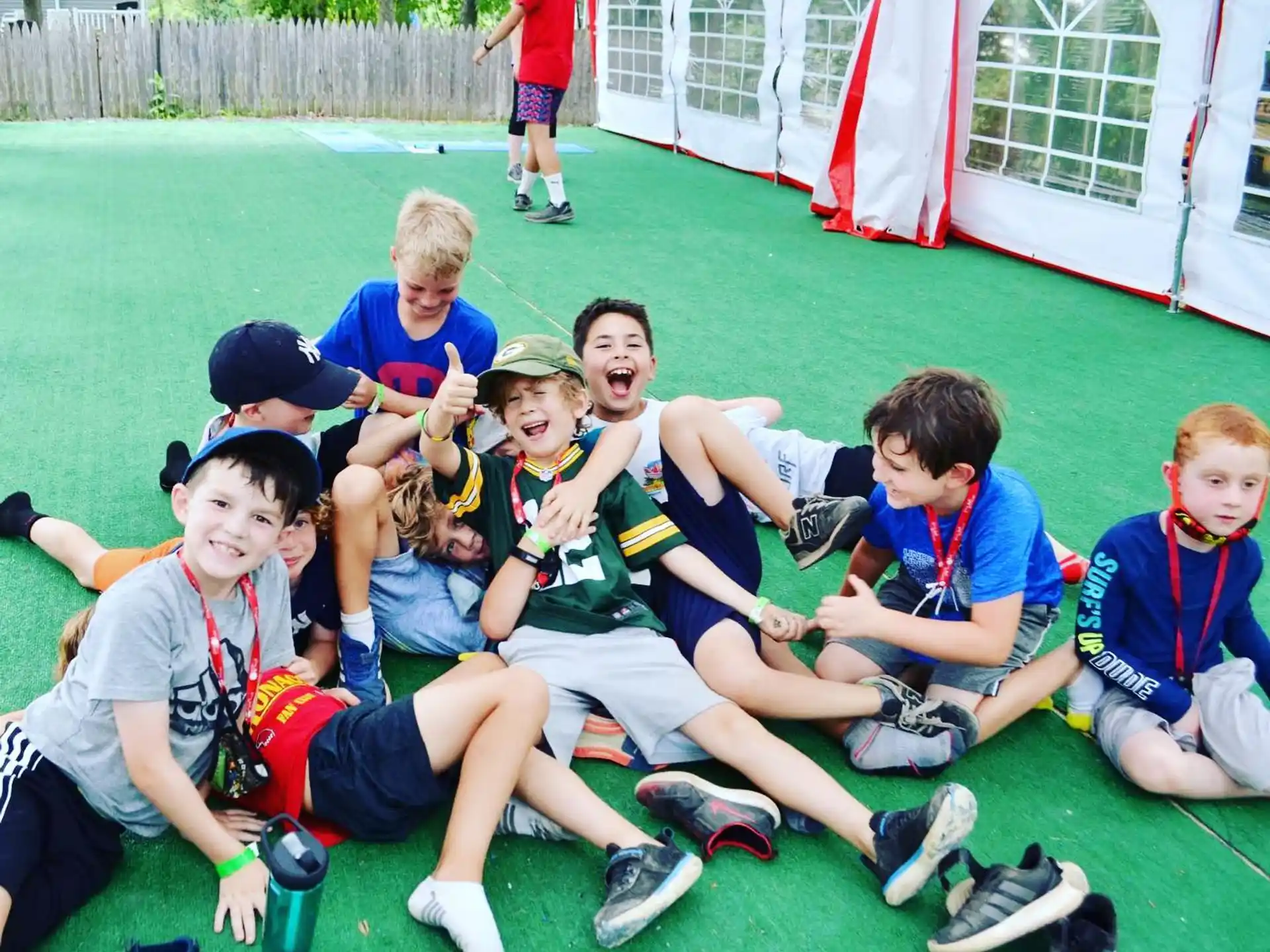 a group of kids posing for a photo