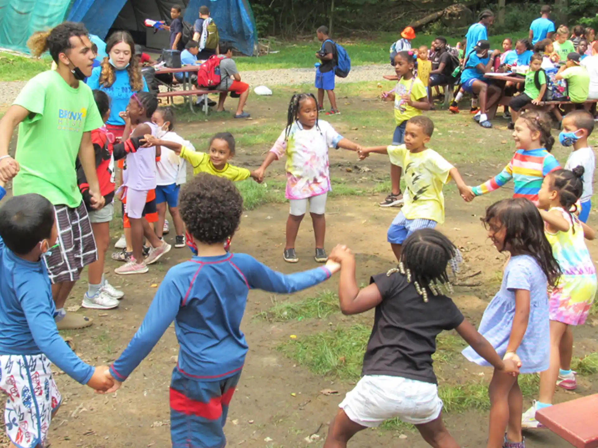 a group of children playing in a yard