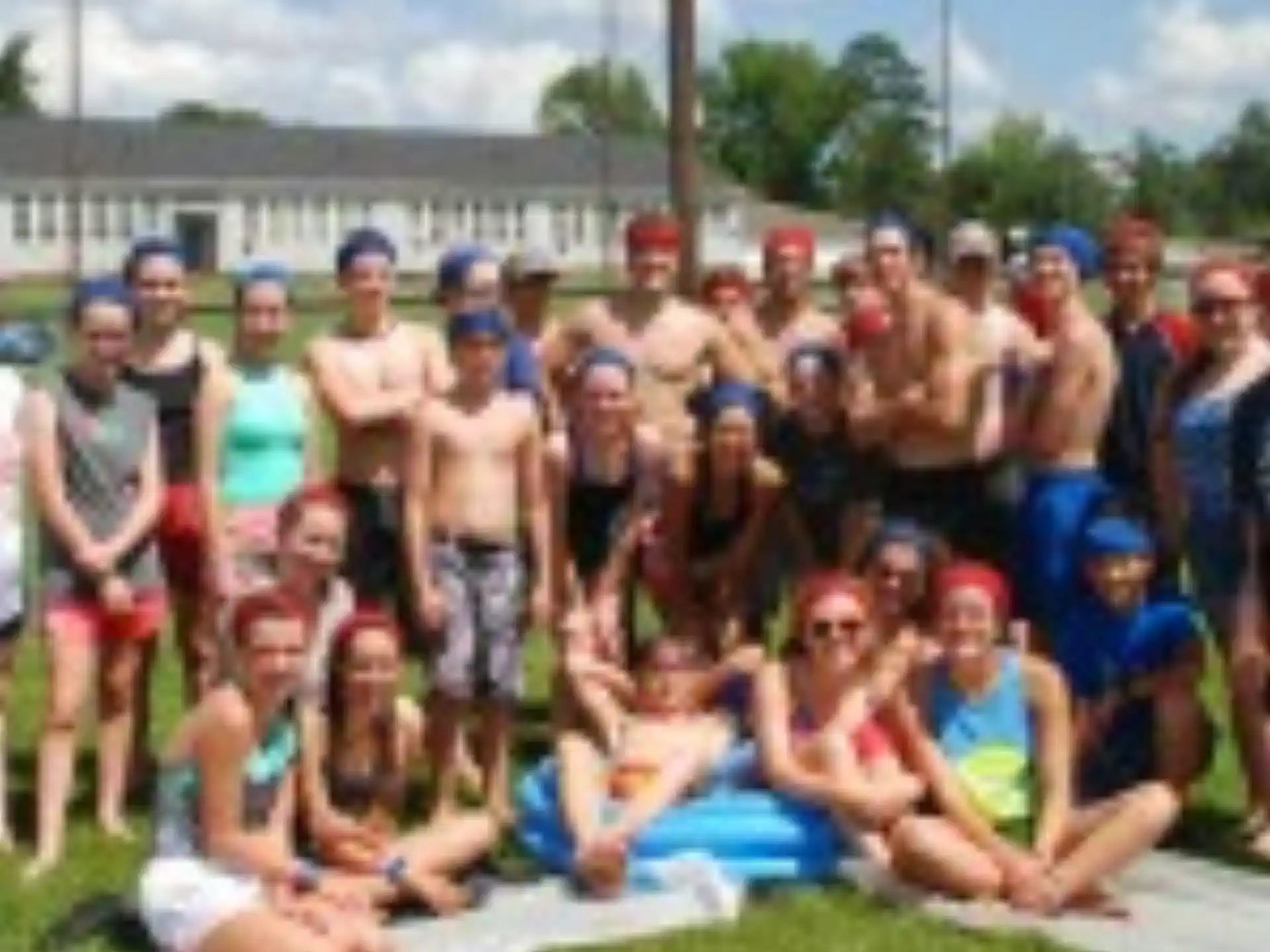 a large group of people posing for a photo