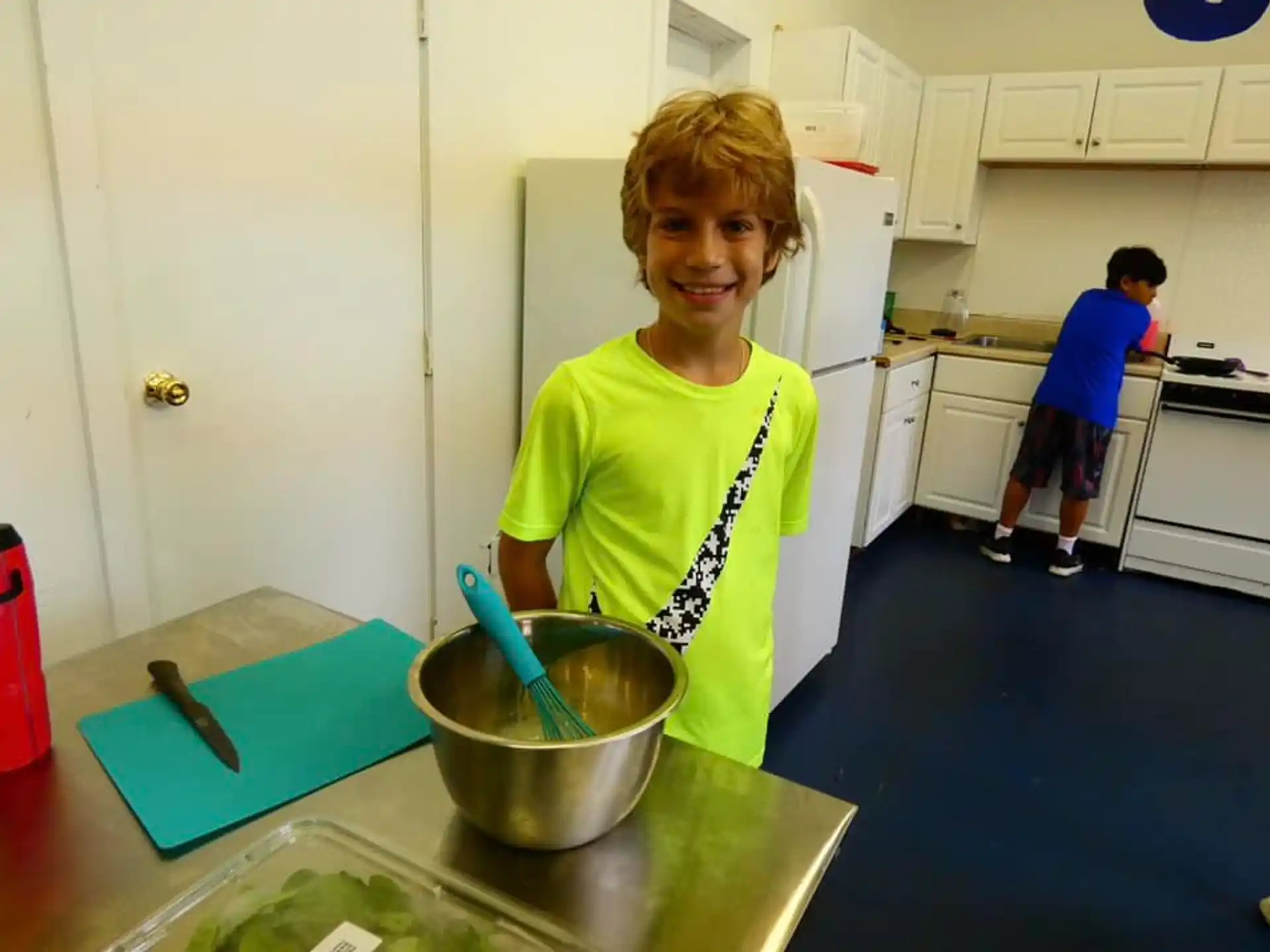 a boy in a kitchen