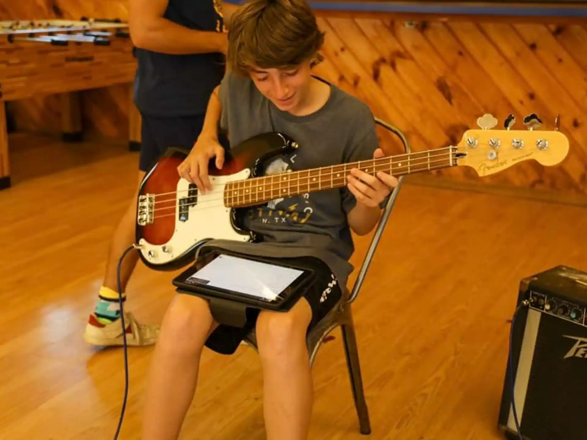 a person playing a guitar