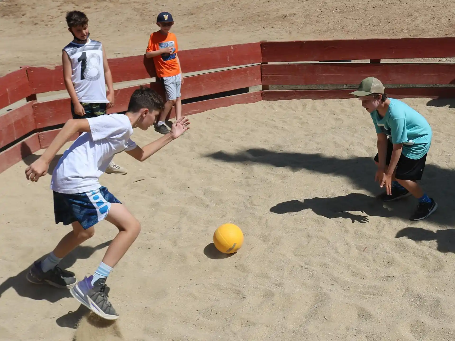 a group of boys playing football