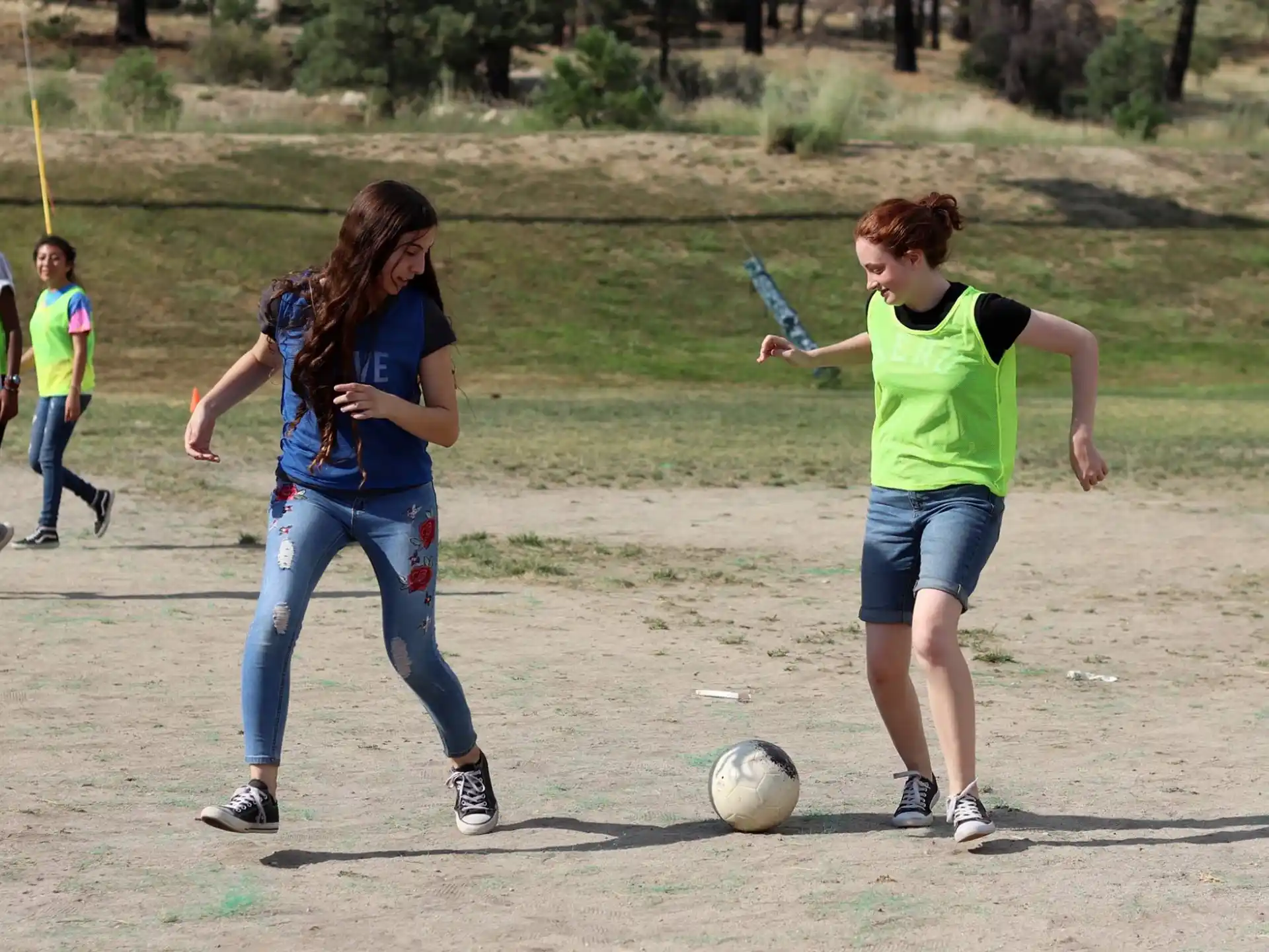 a group of people play football