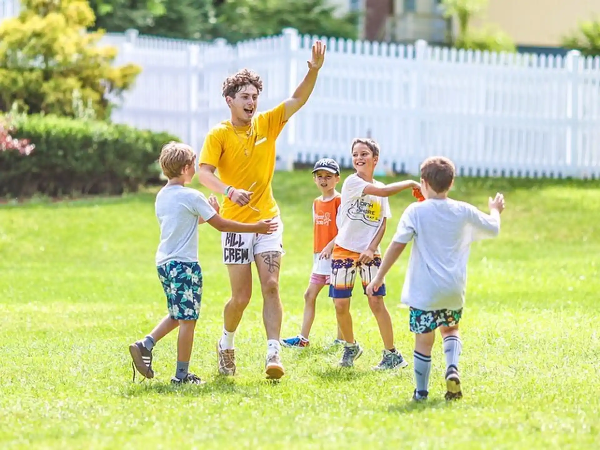 a group of kids playing football