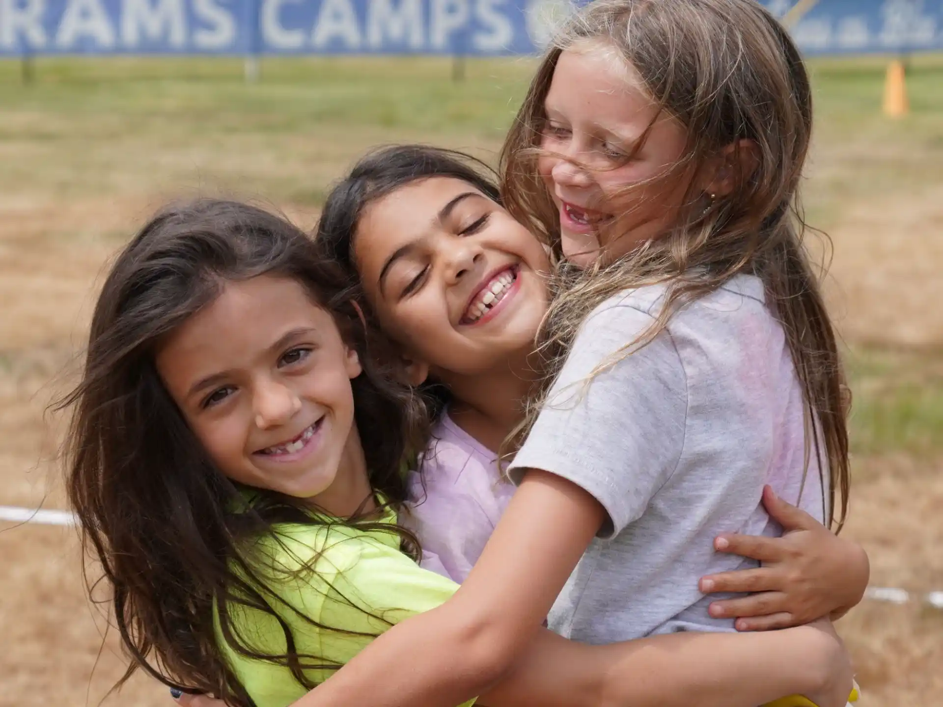 a group of girls smiling