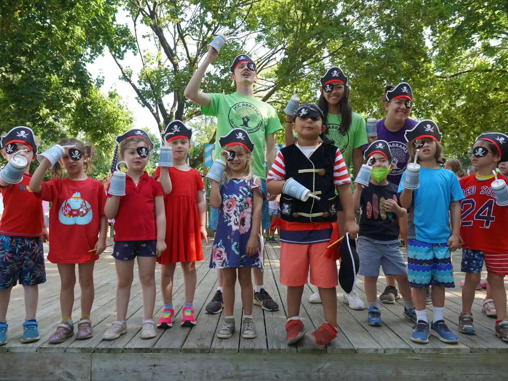 a group of kids posing for a photo