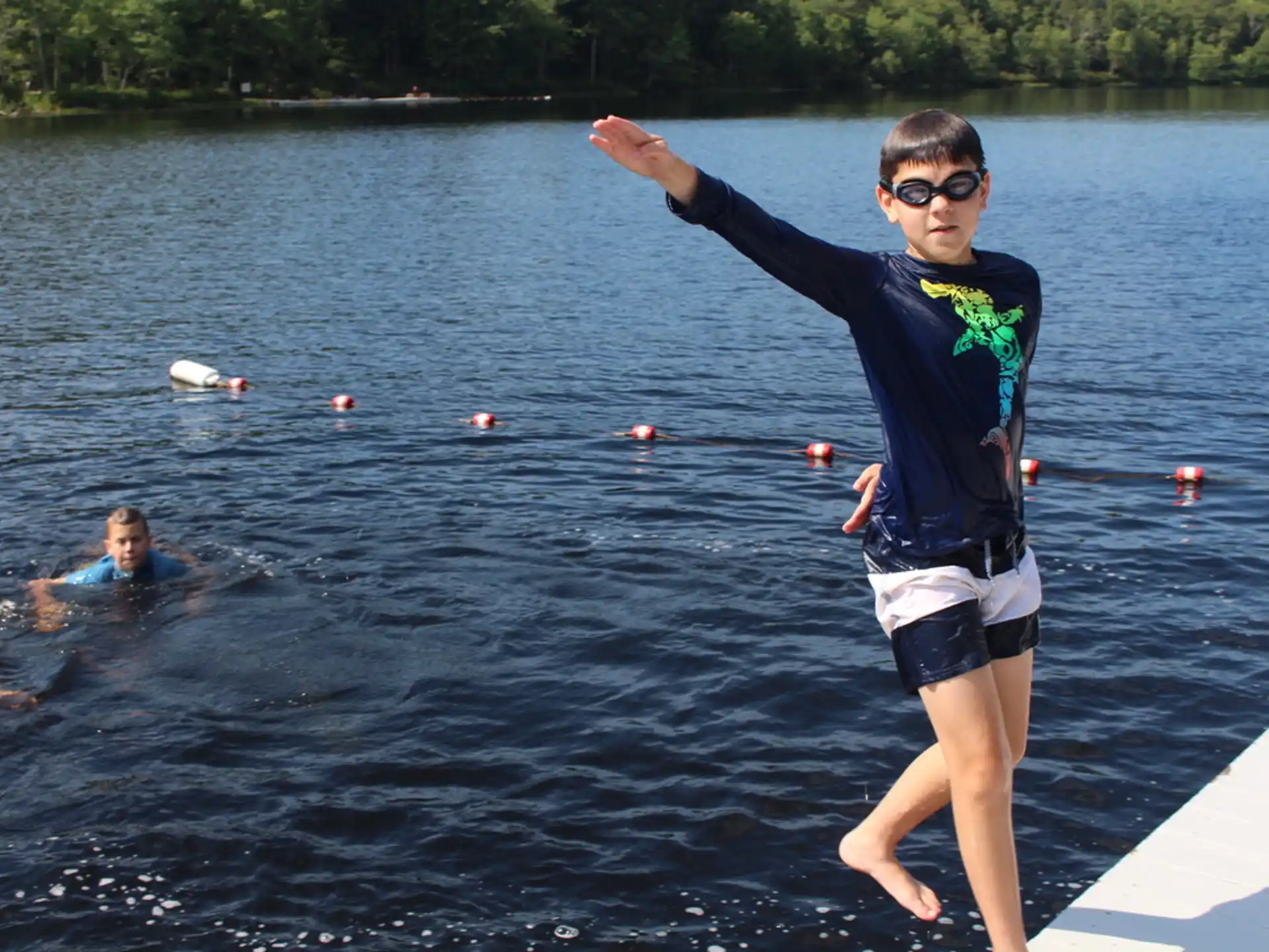 a person jumping into the water