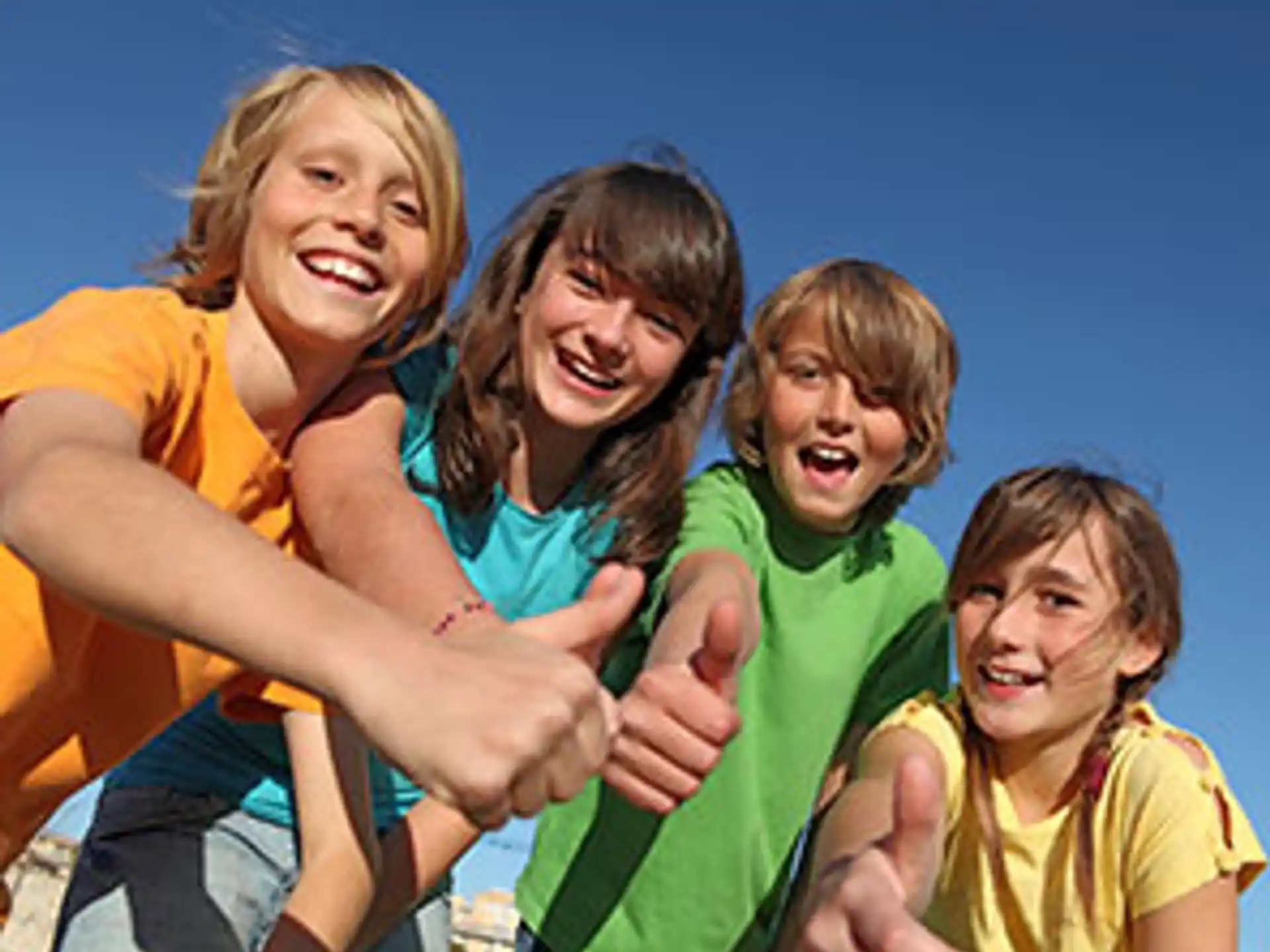 a group of girls smiling