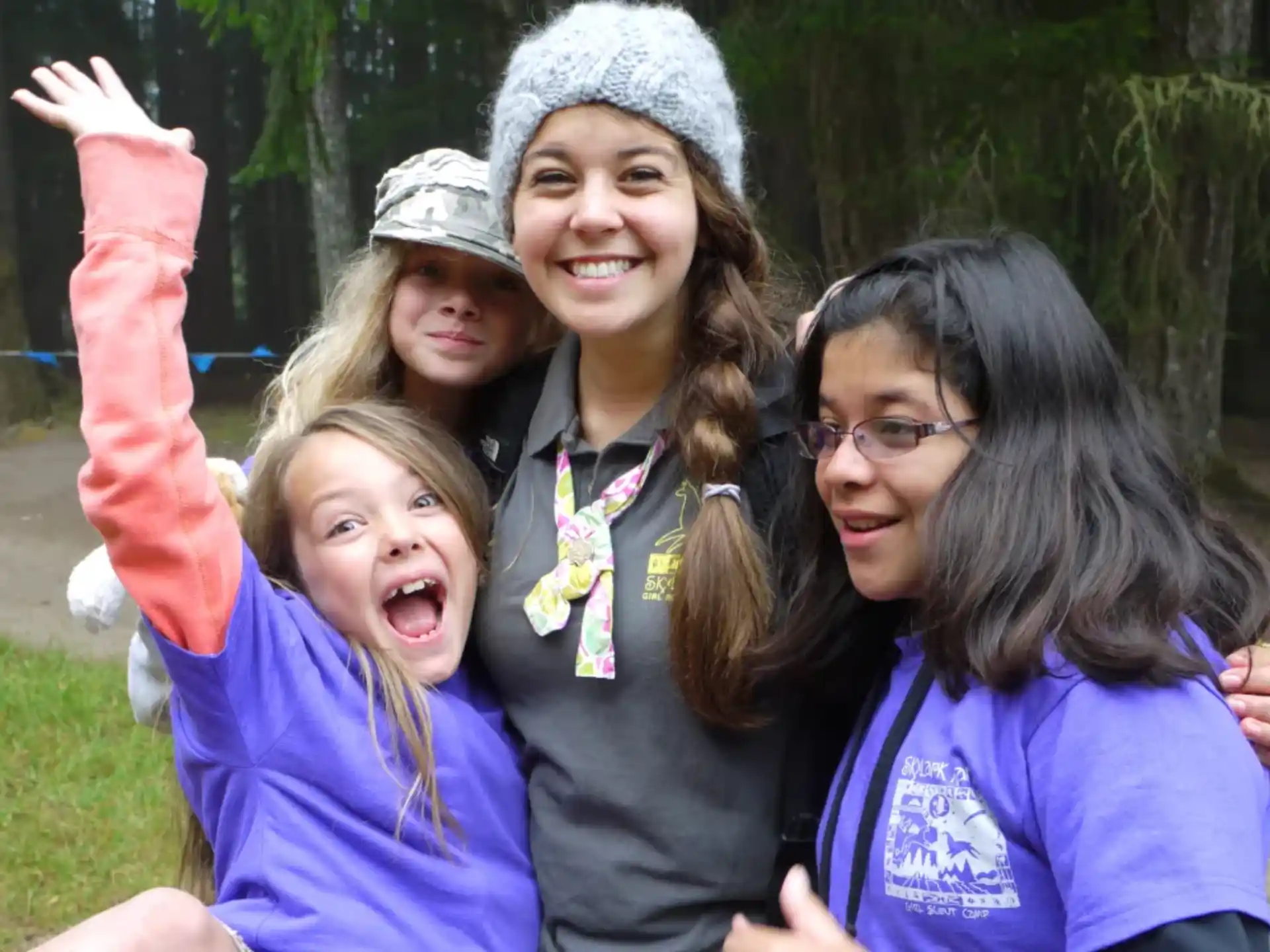 a group of people posing for the camera