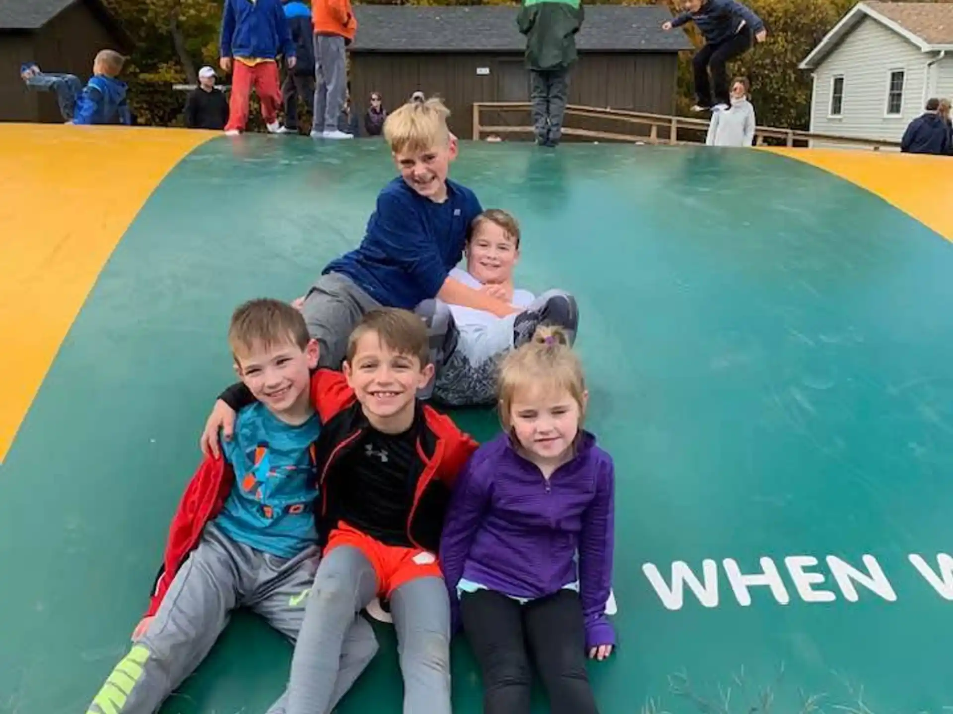 a group of children posing for a photo