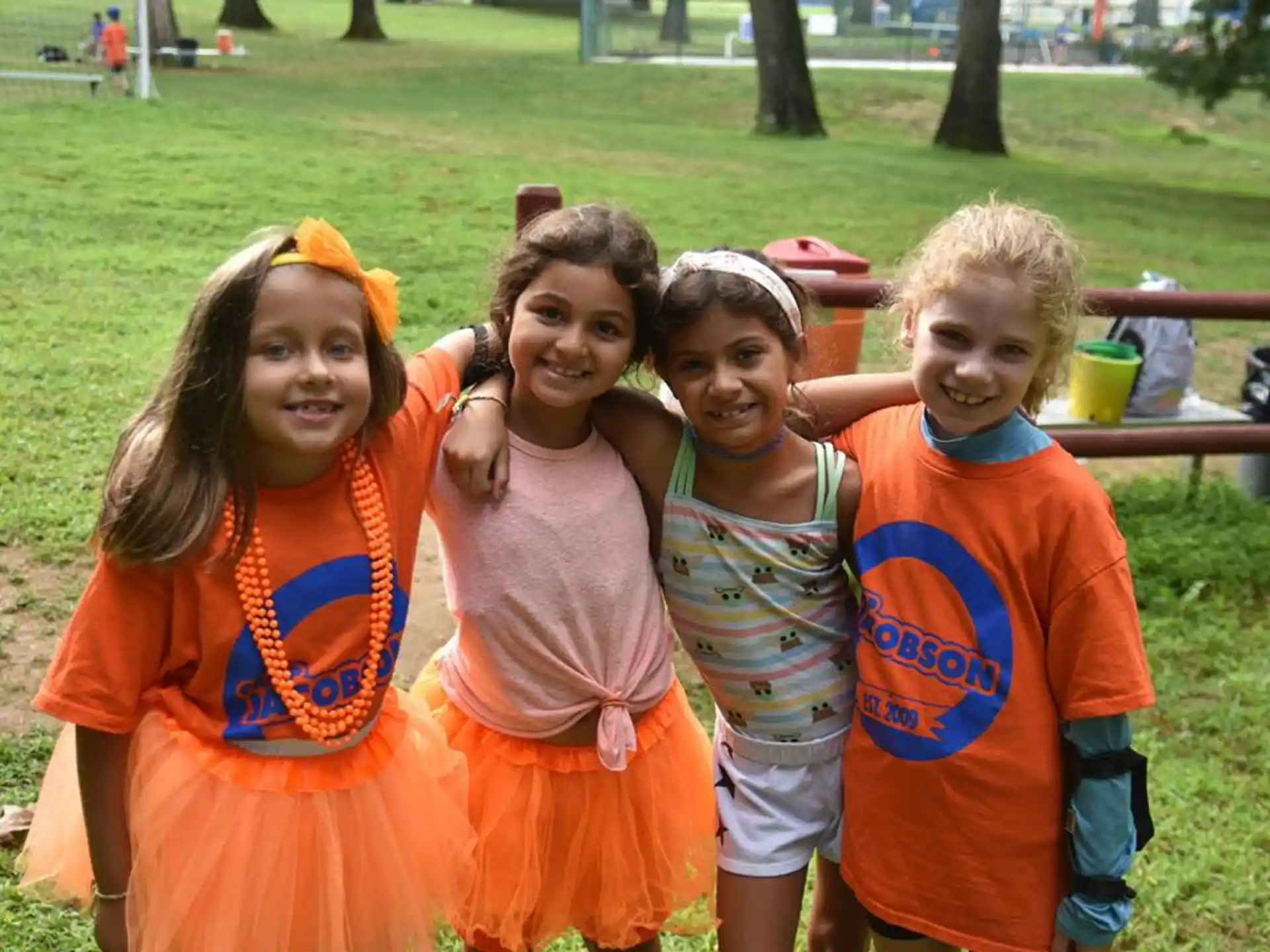 a group of girls posing for a picture