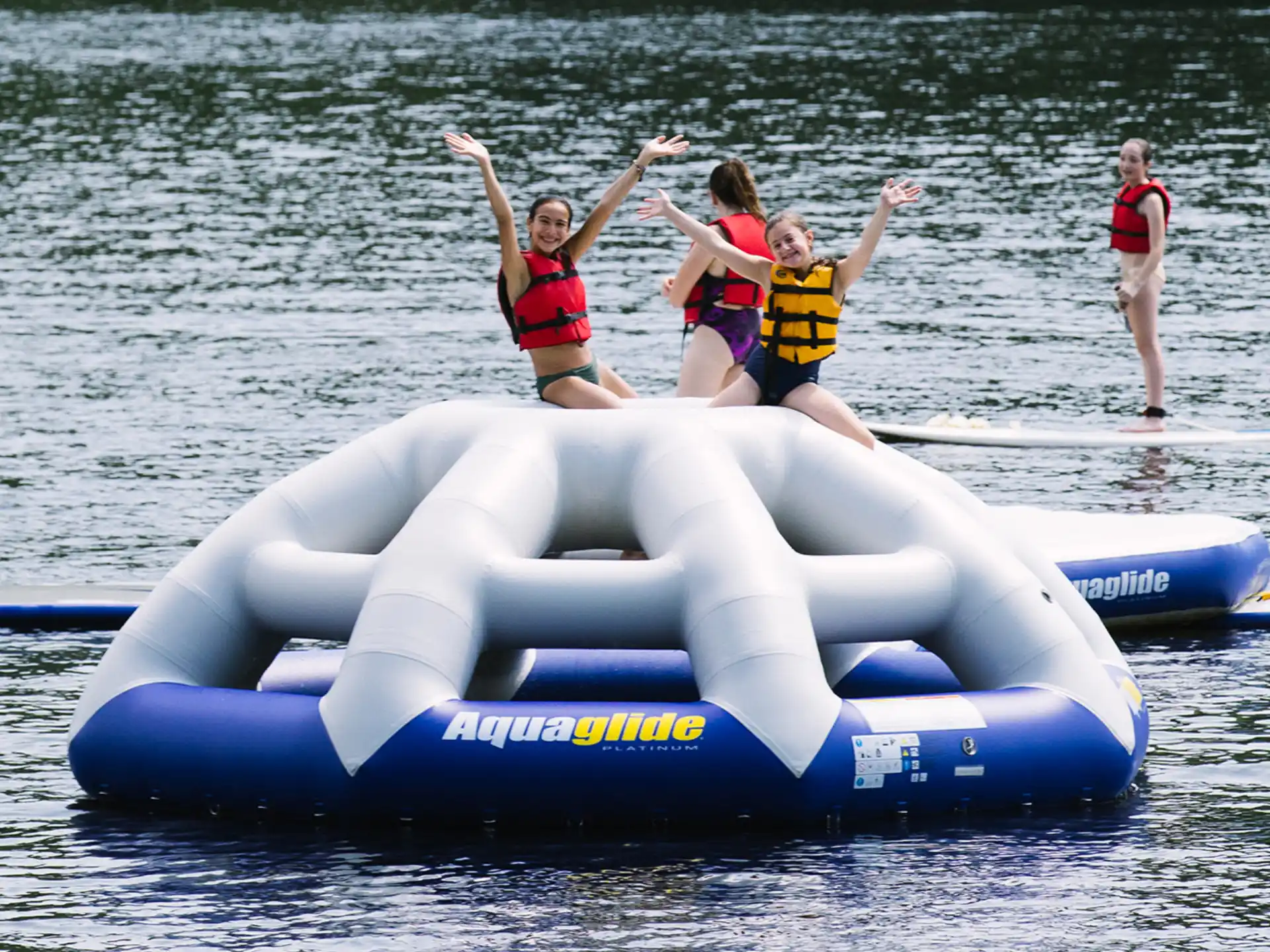 a group of people on a jet ski in the water