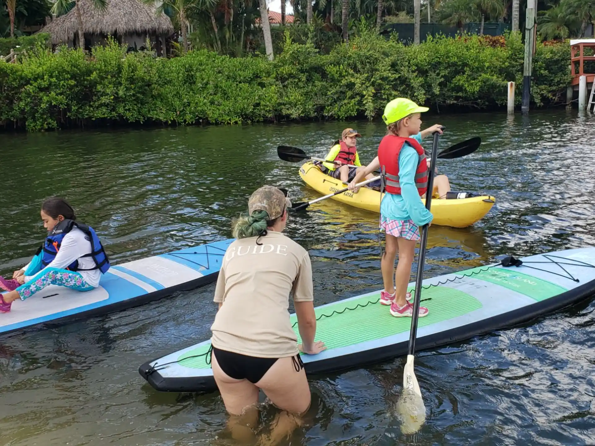 a group of people in kayaks