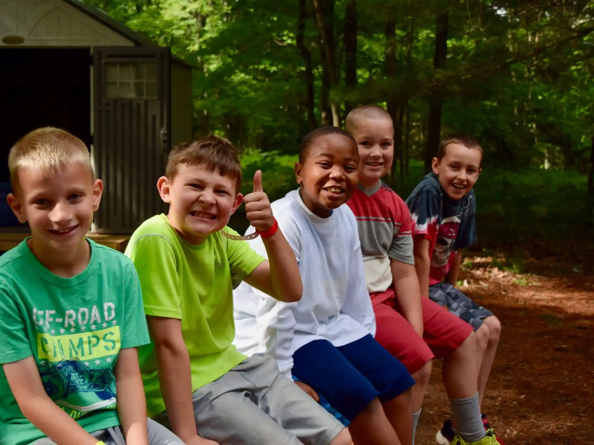 a group of boys posing for a picture