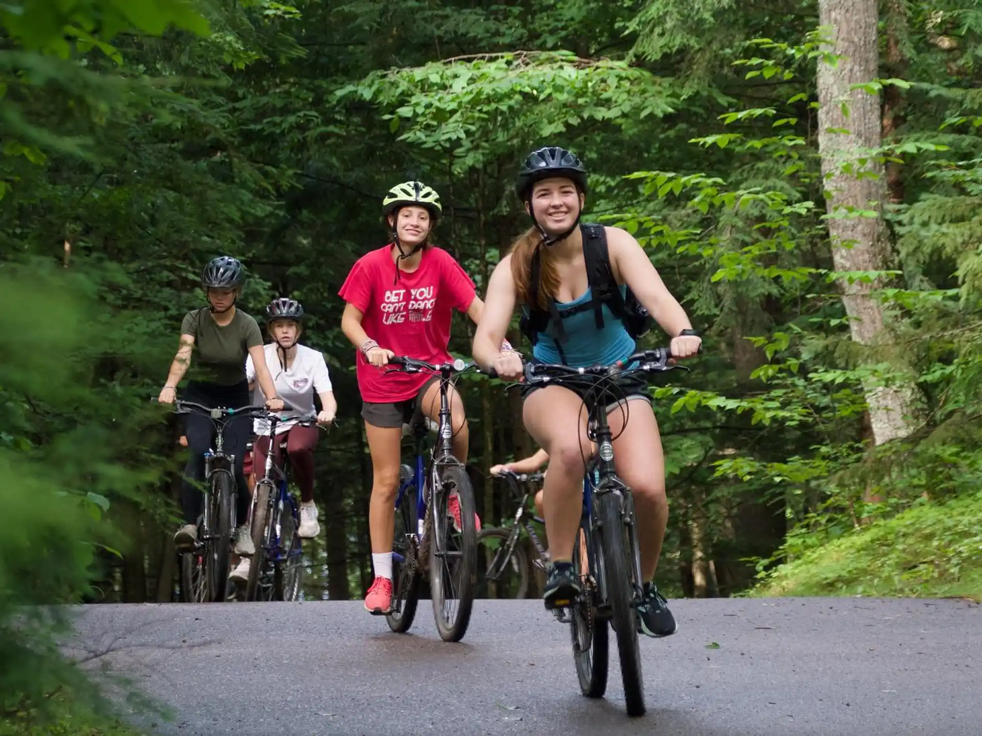 a group of people riding bikes