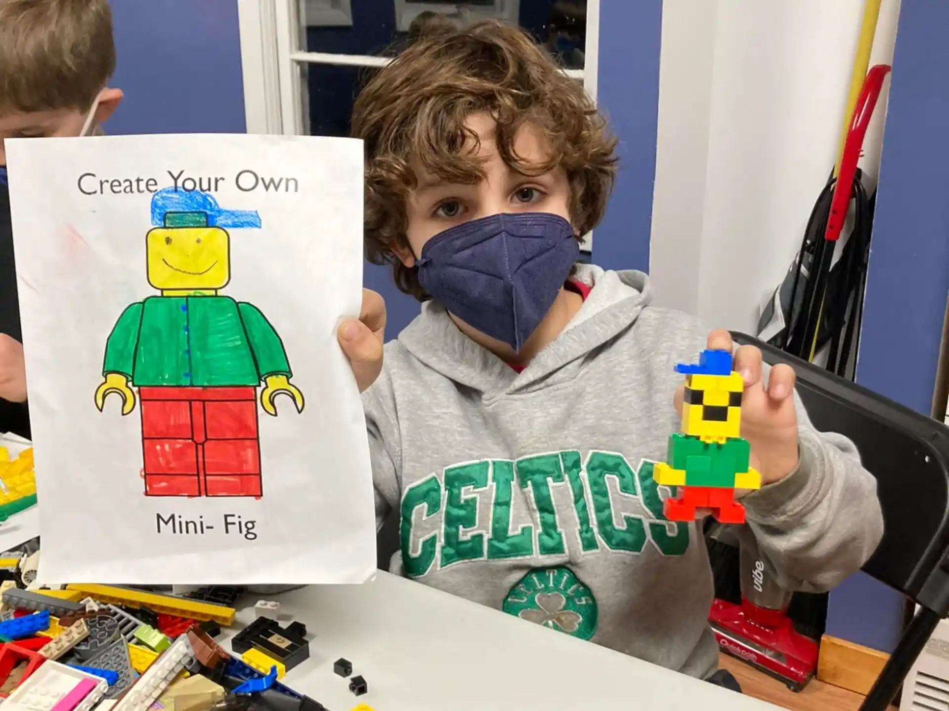 a boy holding a book