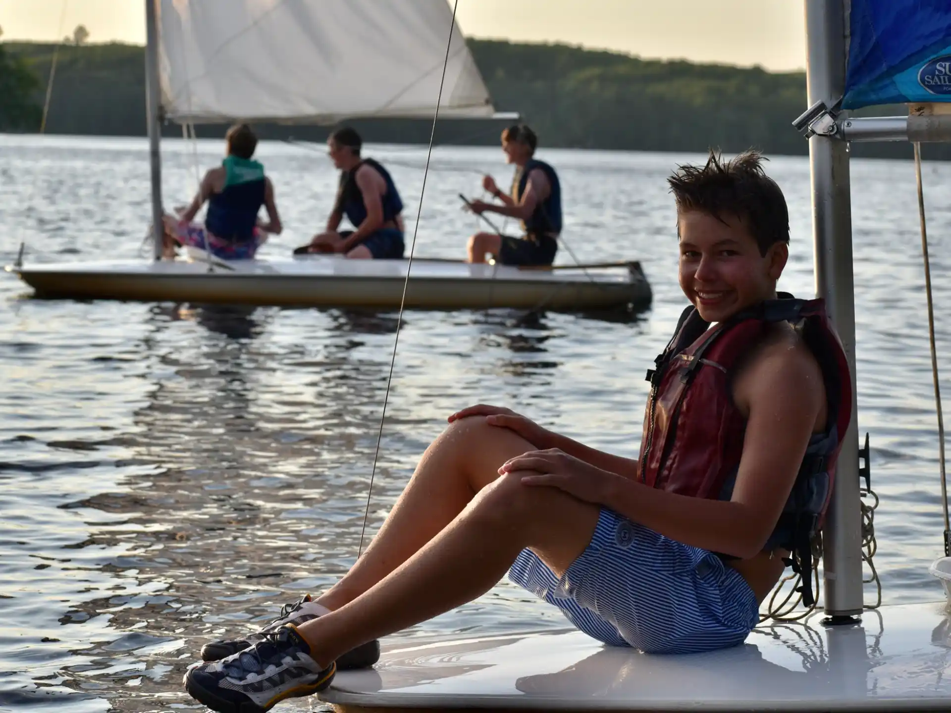 a woman sitting on a boat