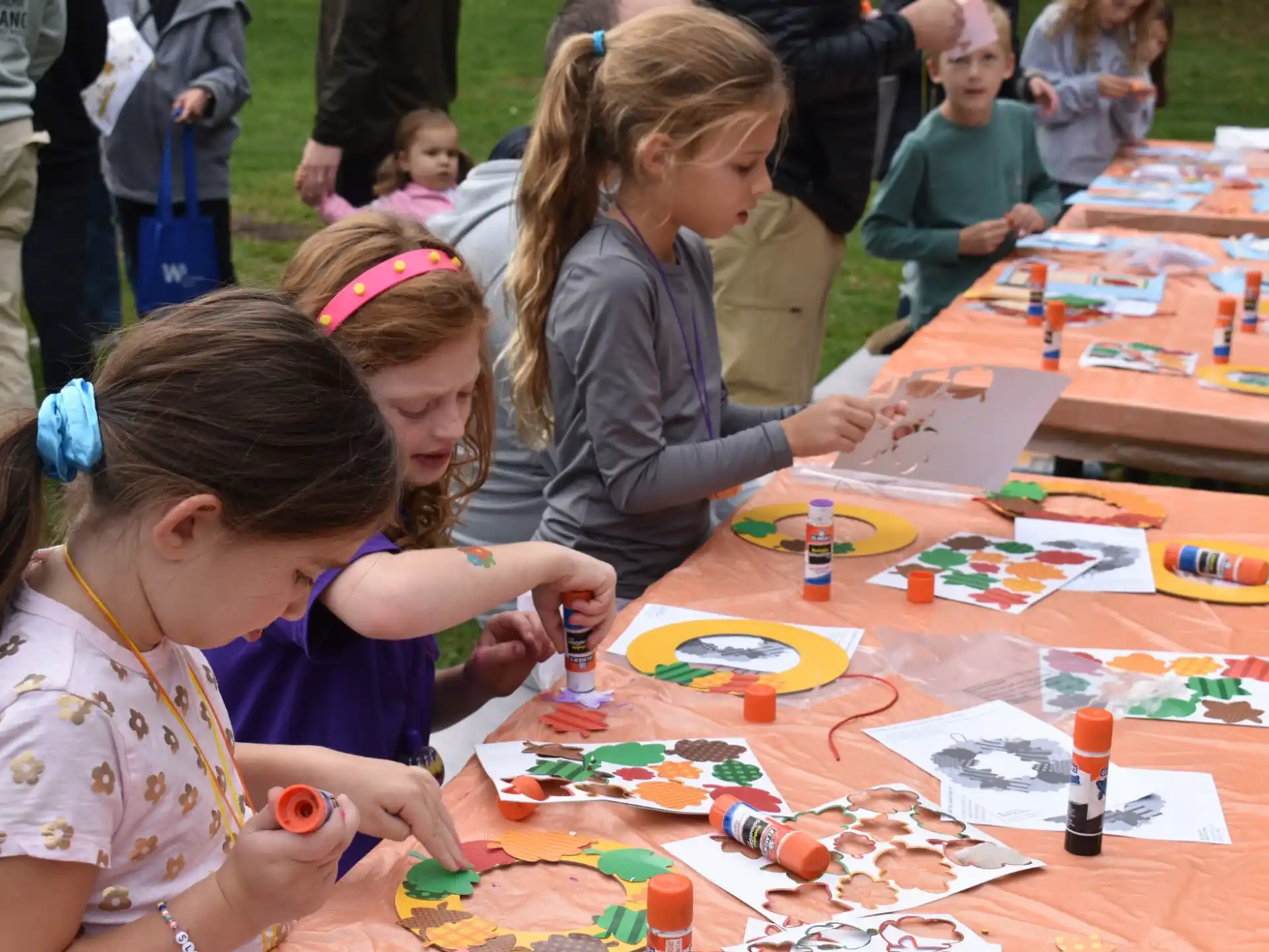 a group of children painting
