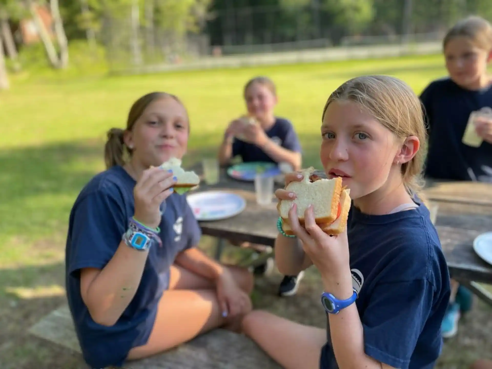 a group of people eating outside