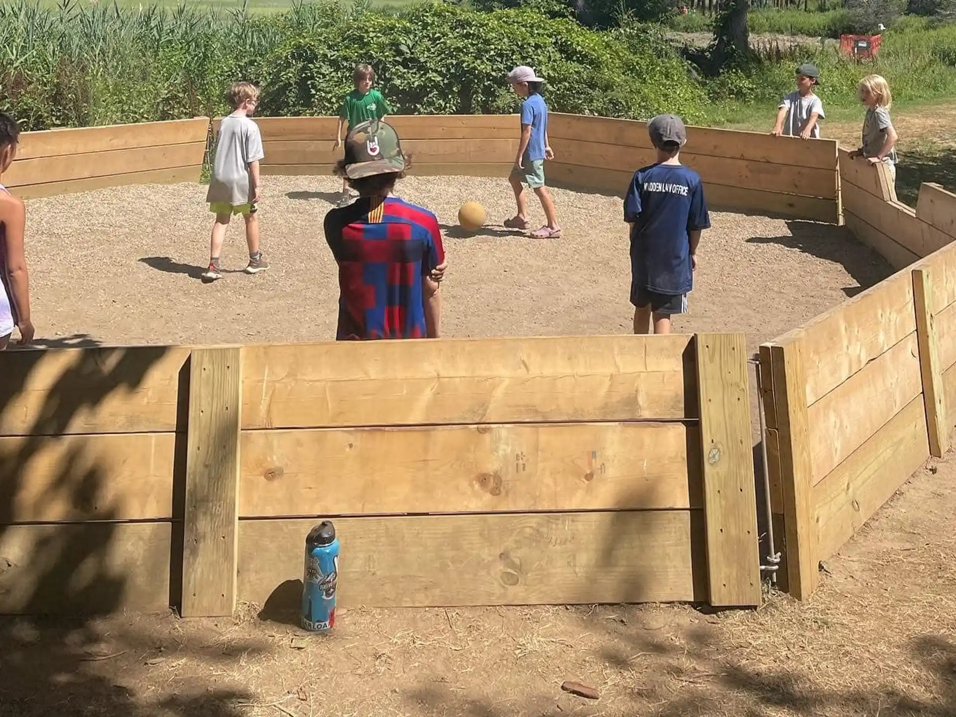 a group of people playing volleyball