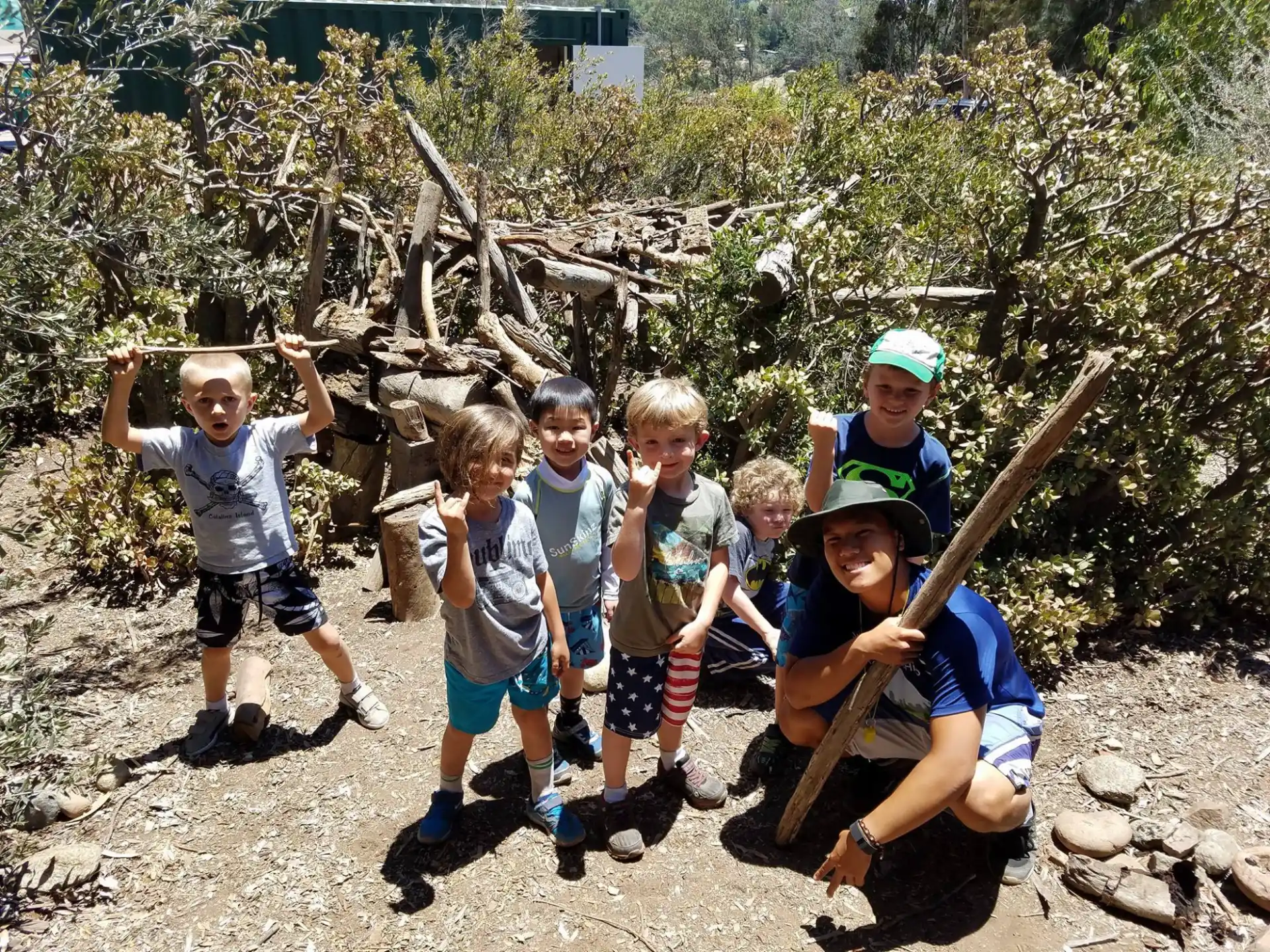 a group of kids posing for a picture