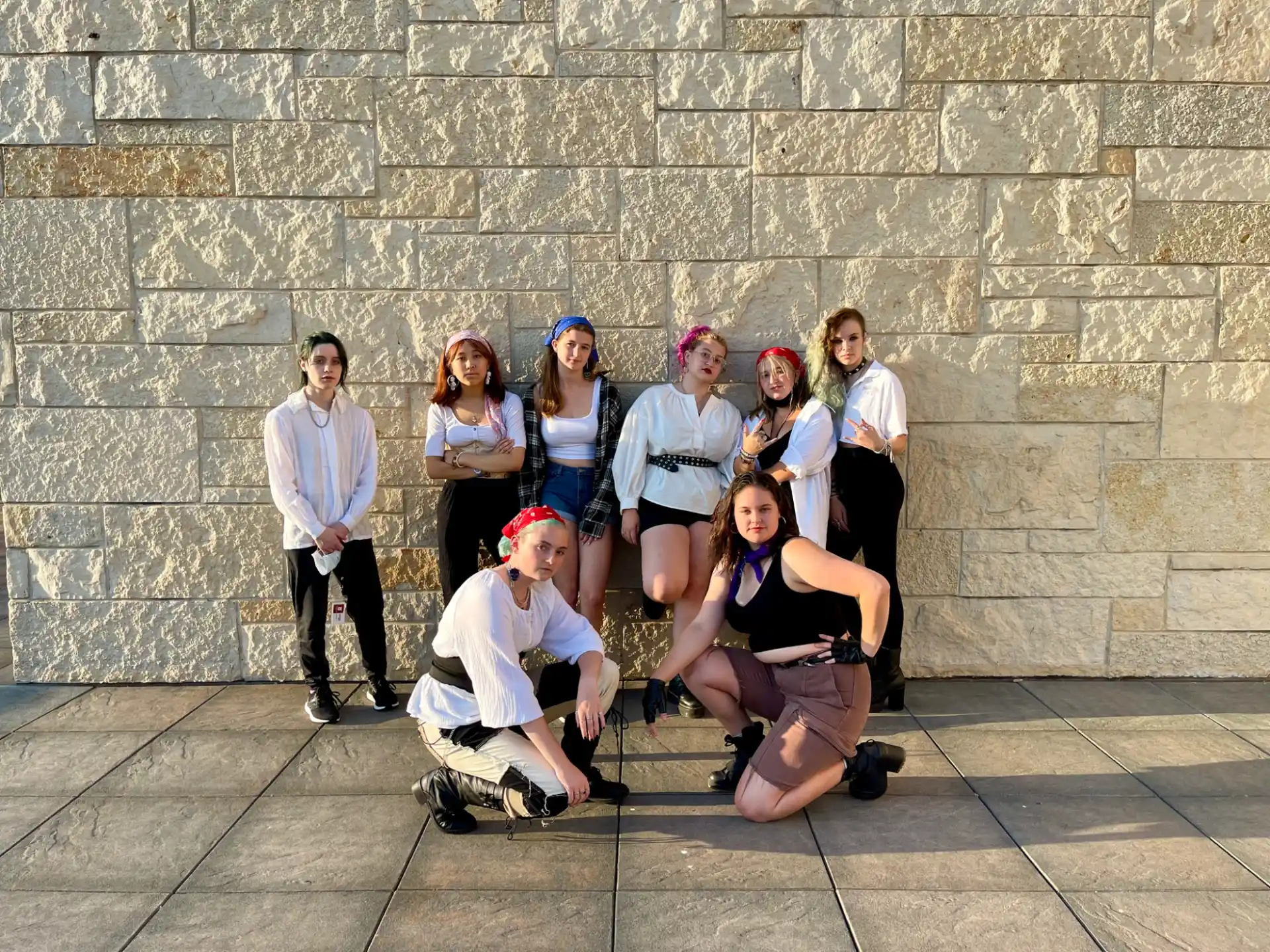a group of people posing for a photo