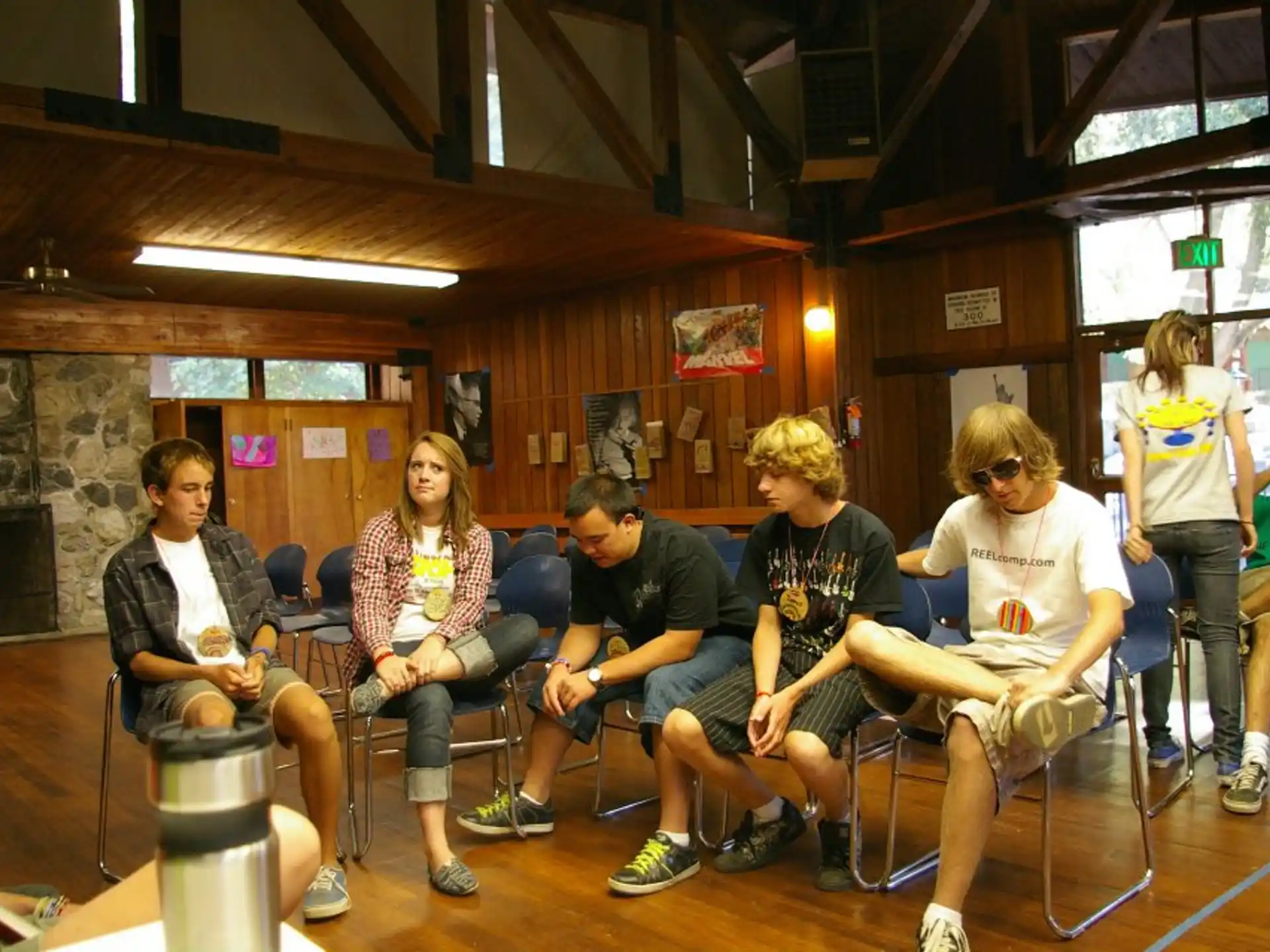 a group of people sitting in chairs