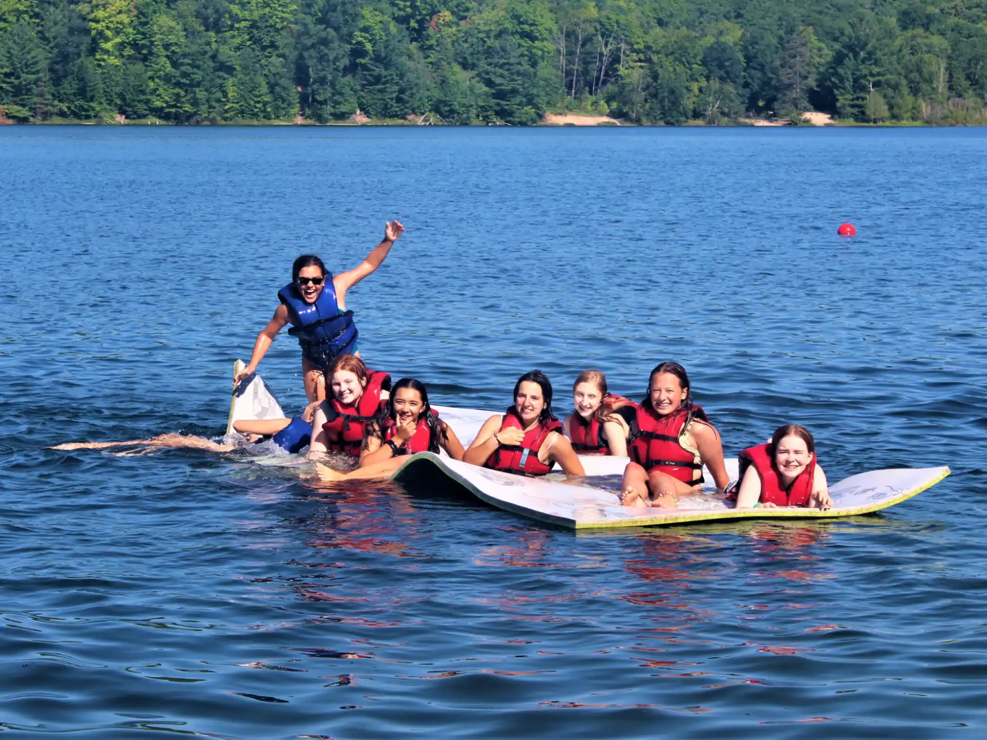 a group of people on a raft