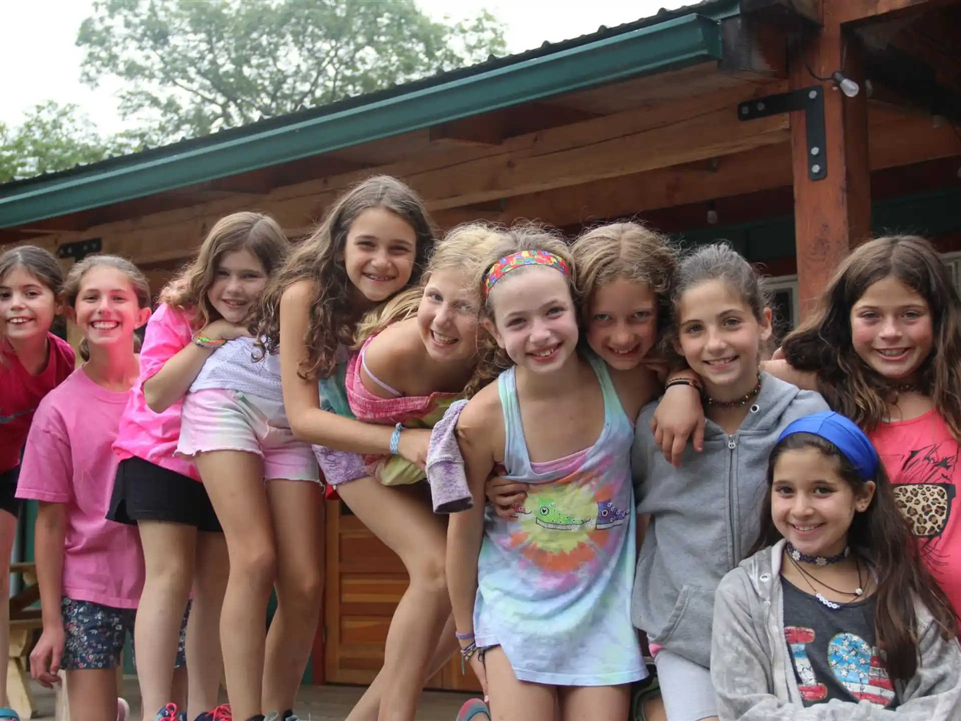 a group of girls posing for a photo