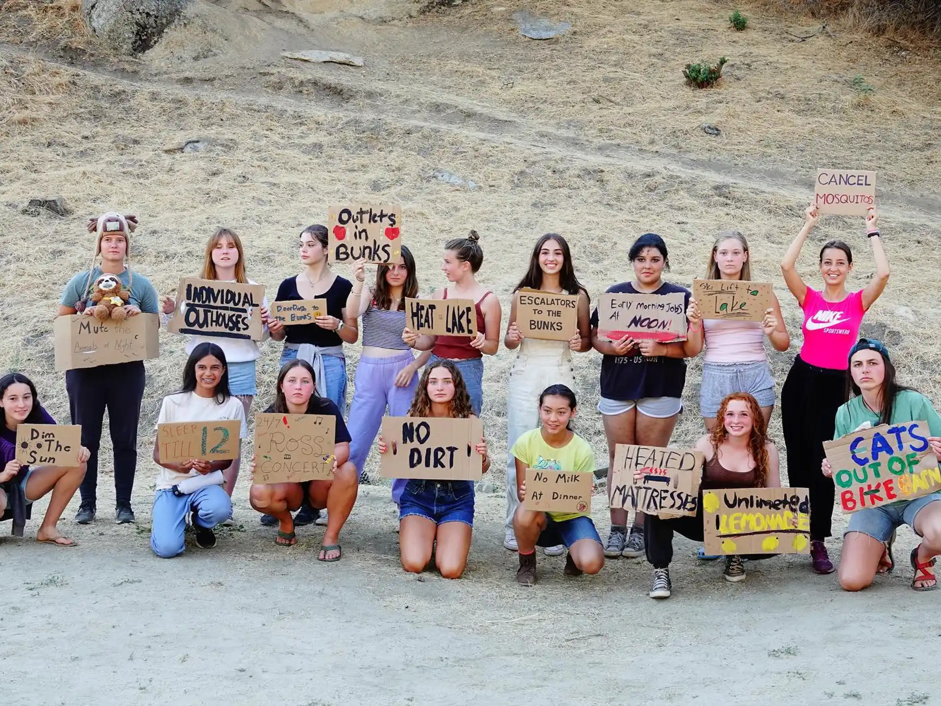 a group of people holding signs