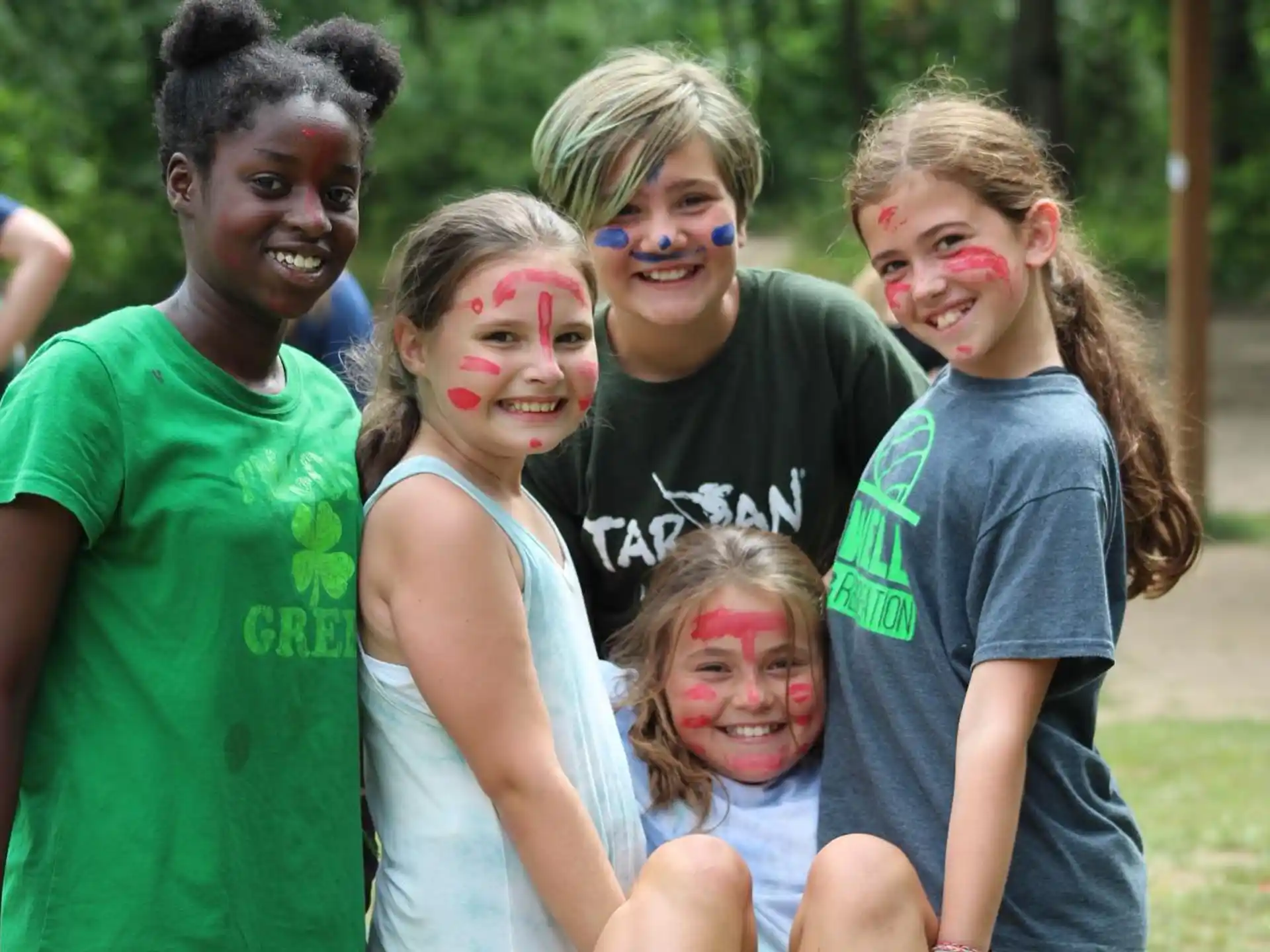 a group of people with face paint